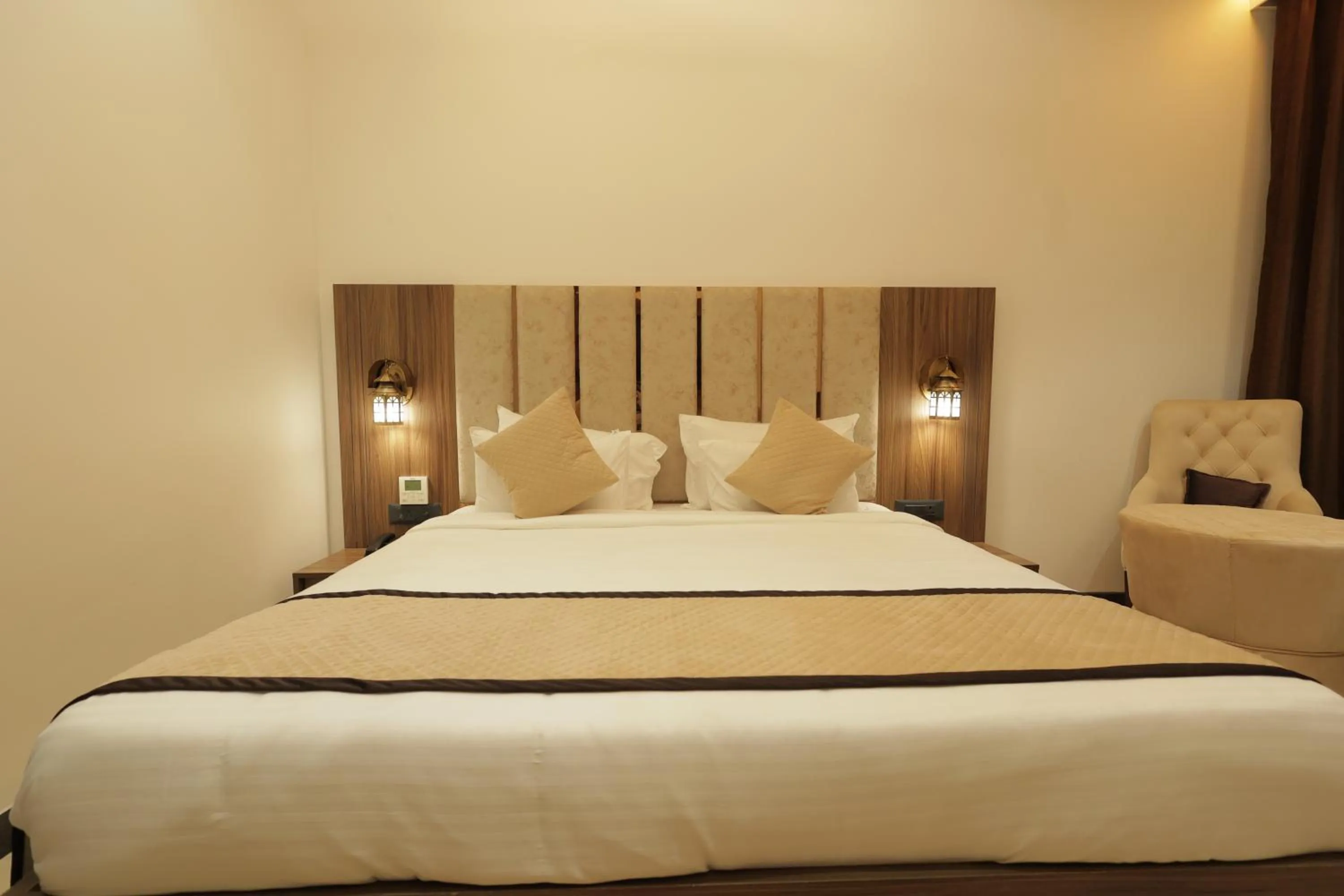 Bed in SNJ Taj Grand