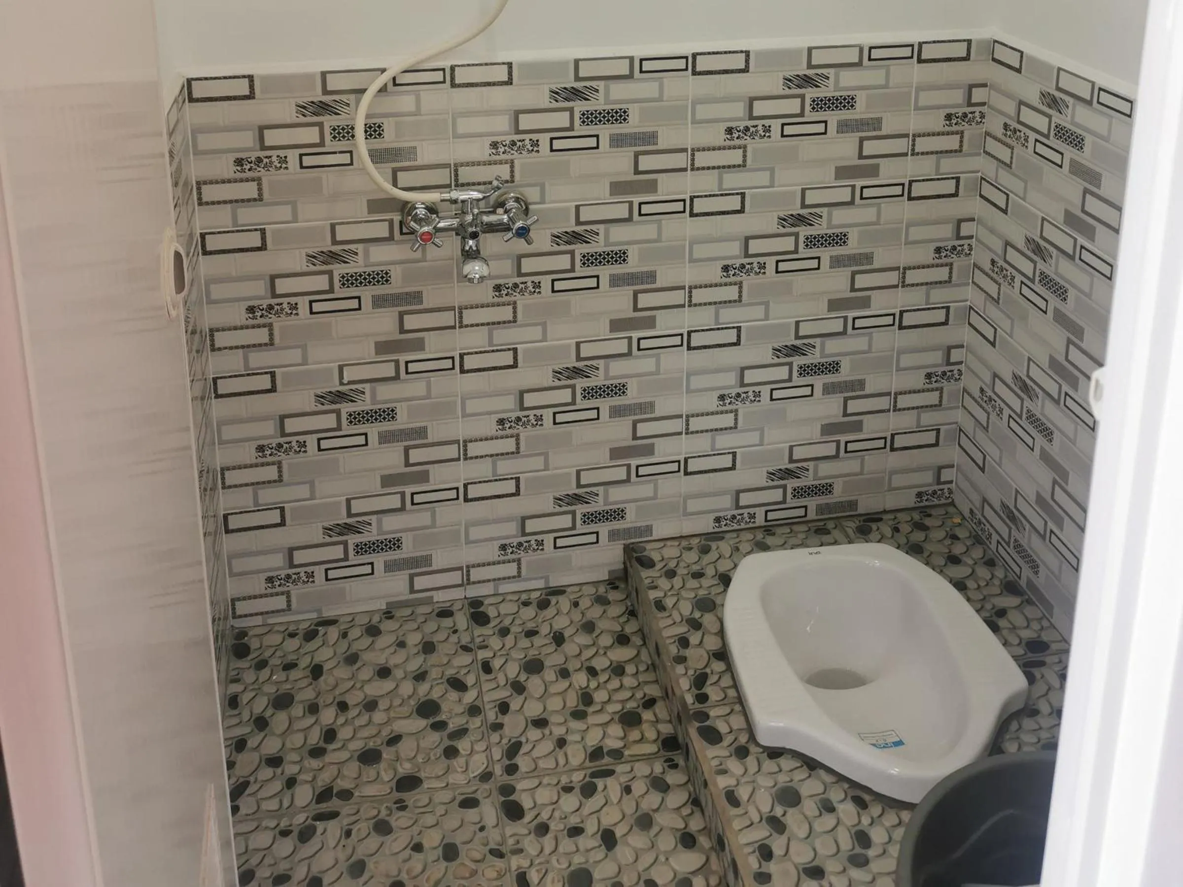 Bathroom in corak alam glamping