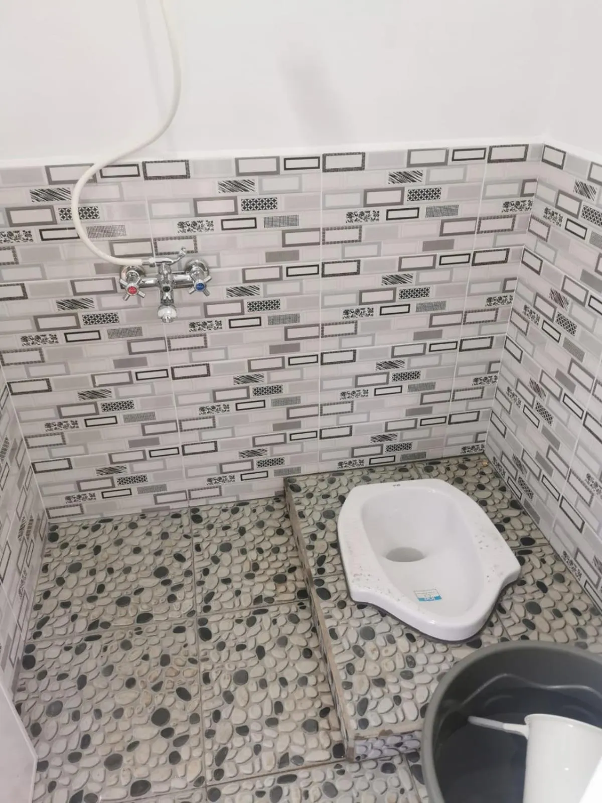 Bathroom in corak alam glamping