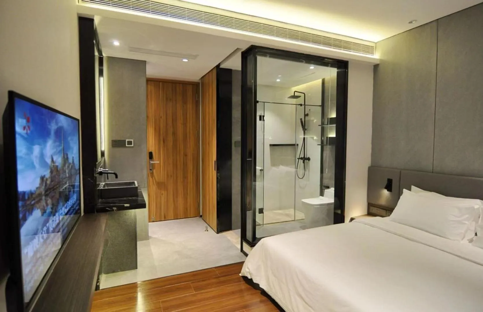 Bed in Elong Etang Hotel Guangzhou Baiyun Airport Renhe Railway Station