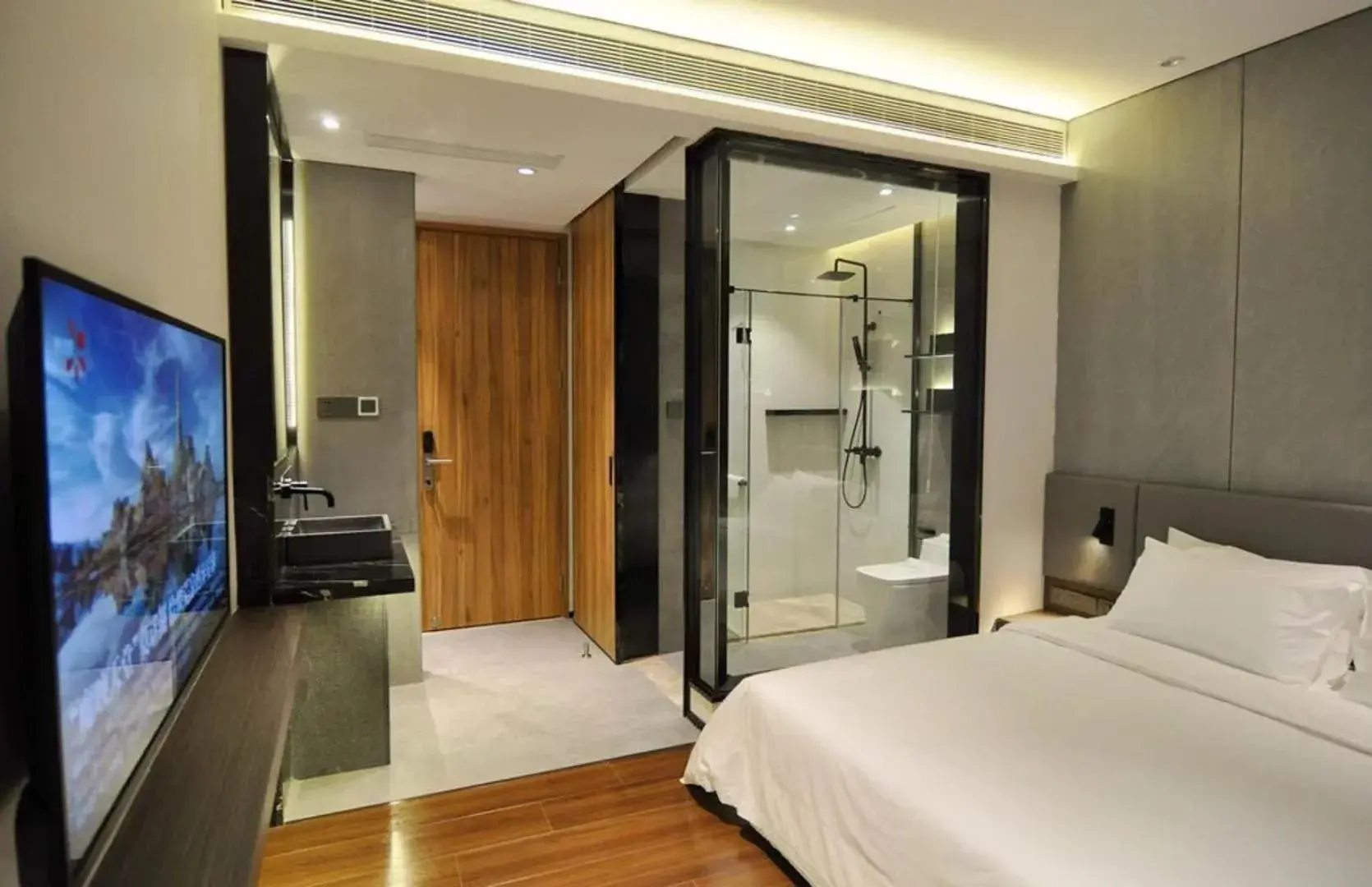 Bed in Elong Etang Hotel Guangzhou Baiyun Airport Renhe Railway Station Bed in Elong Etang Hotel Guangzhou Baiyun Airport Renhe Railway Station