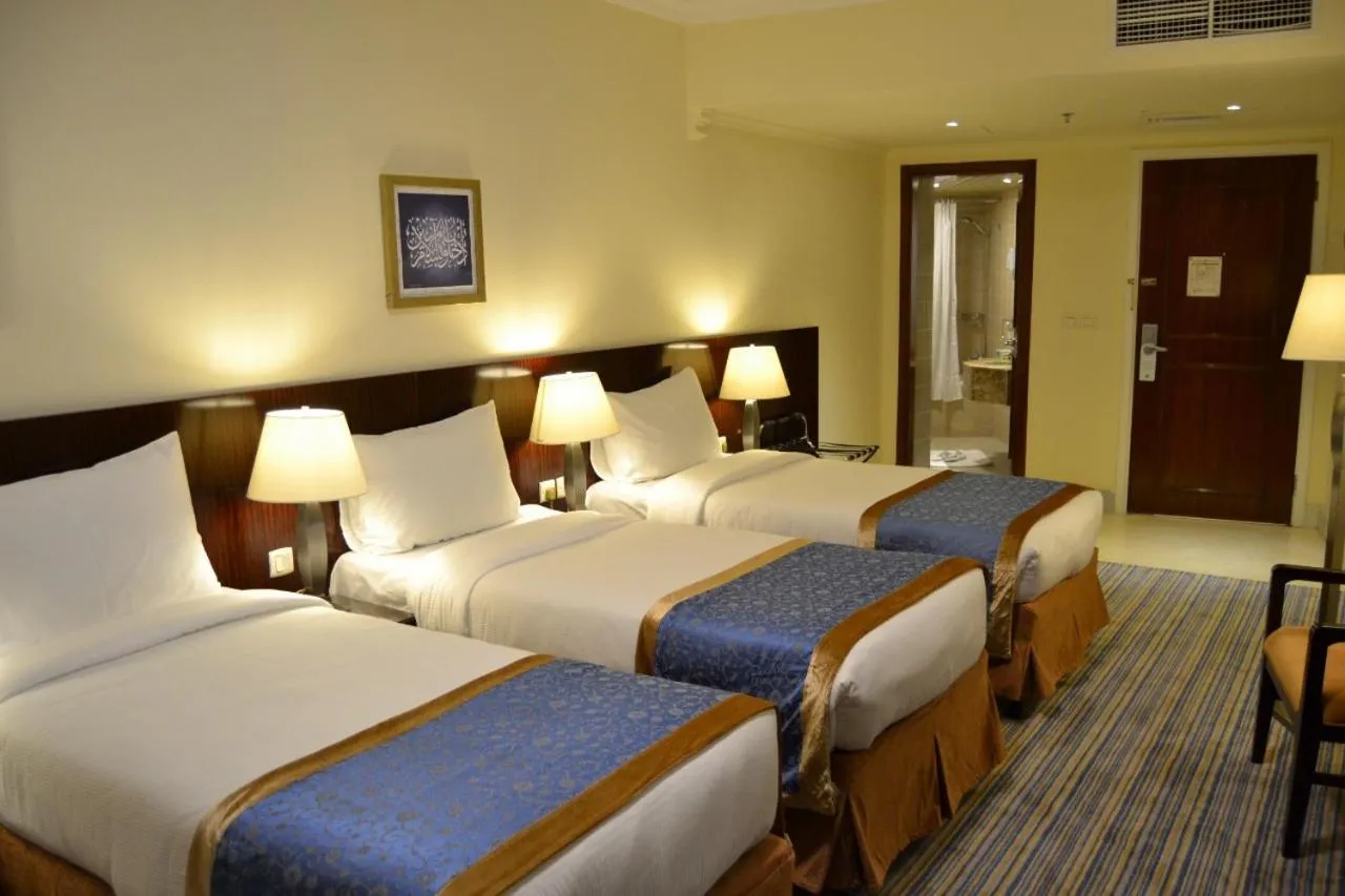 Bed in Arkan Al Manar Hotel