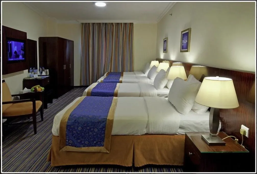 Bed in Arkan Al Manar Hotel