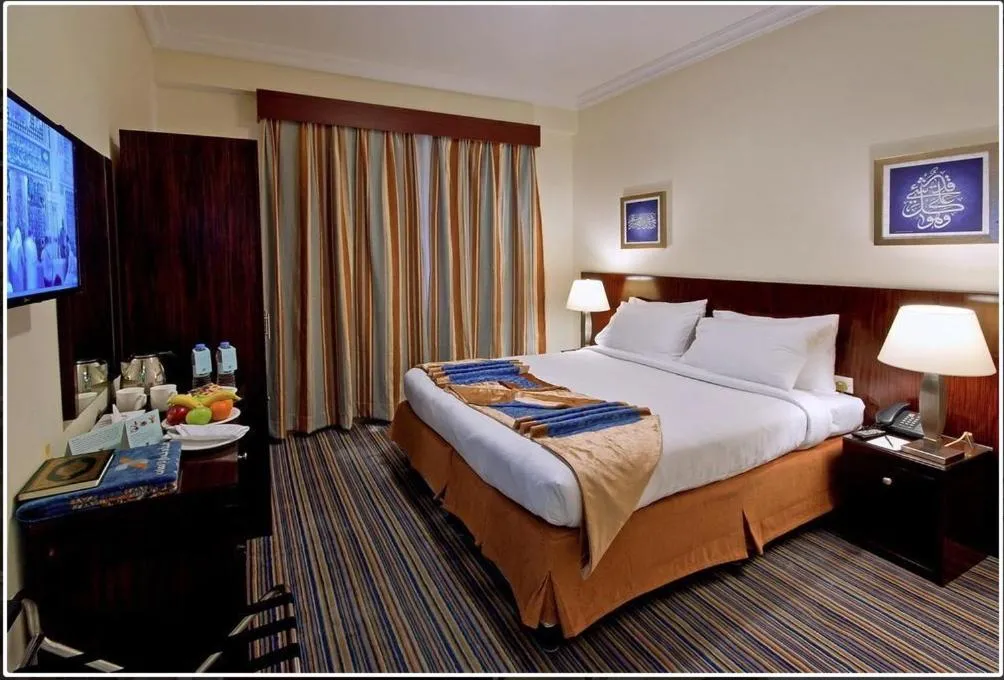 Bed in Arkan Al Manar Hotel