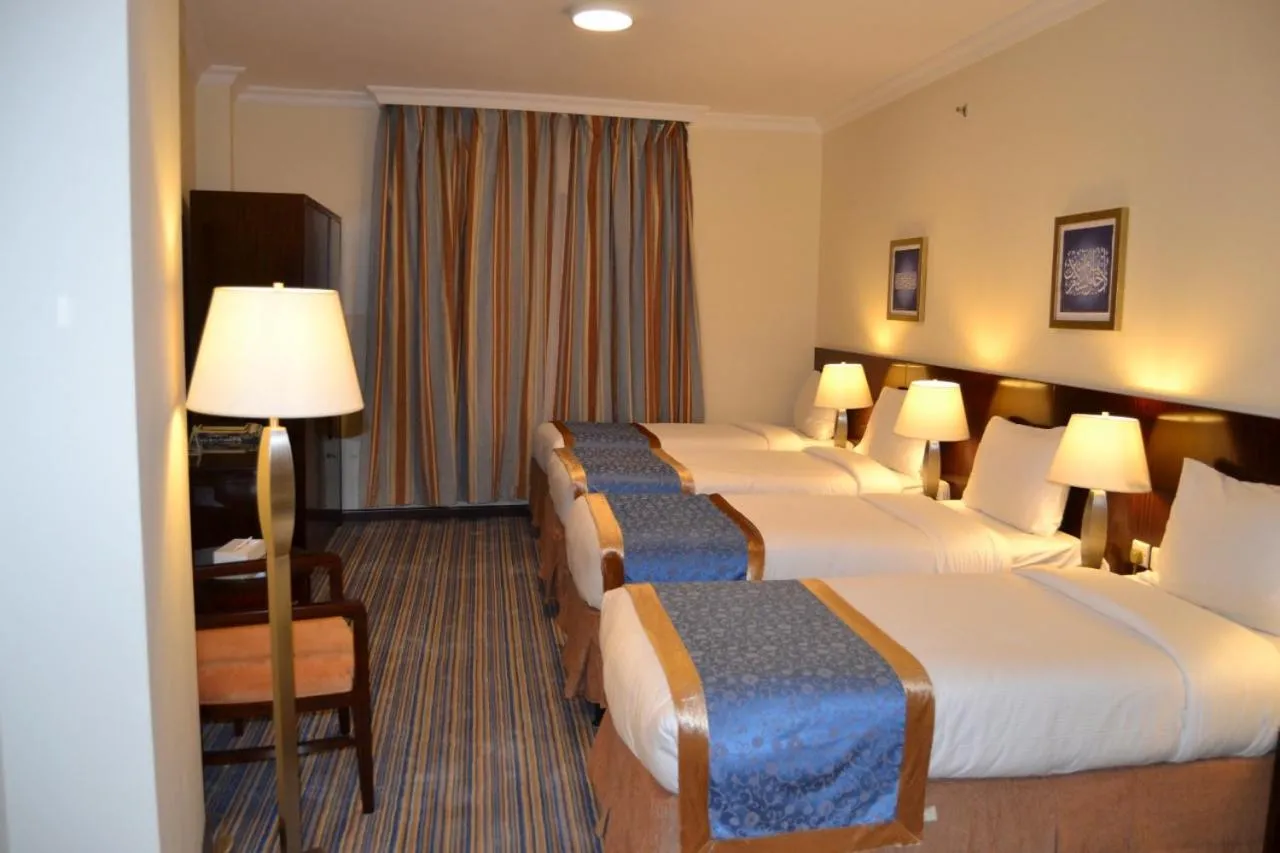 Bed in Arkan Al Manar Hotel