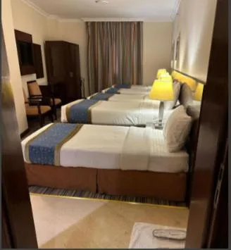 Bed in Arkan Al Manar Hotel