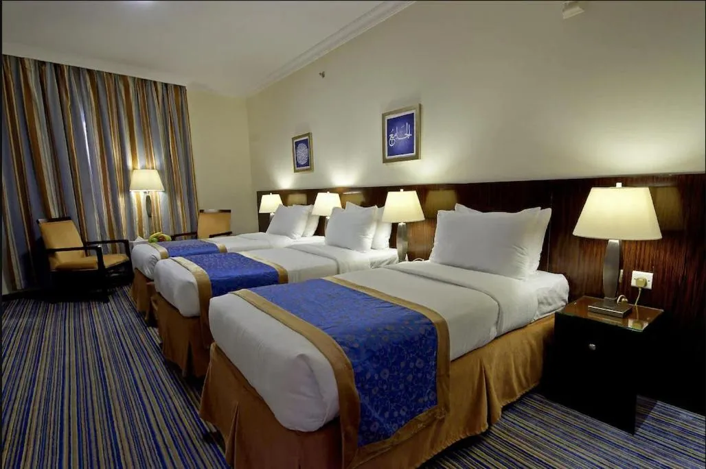 Bed in Arkan Al Manar Hotel