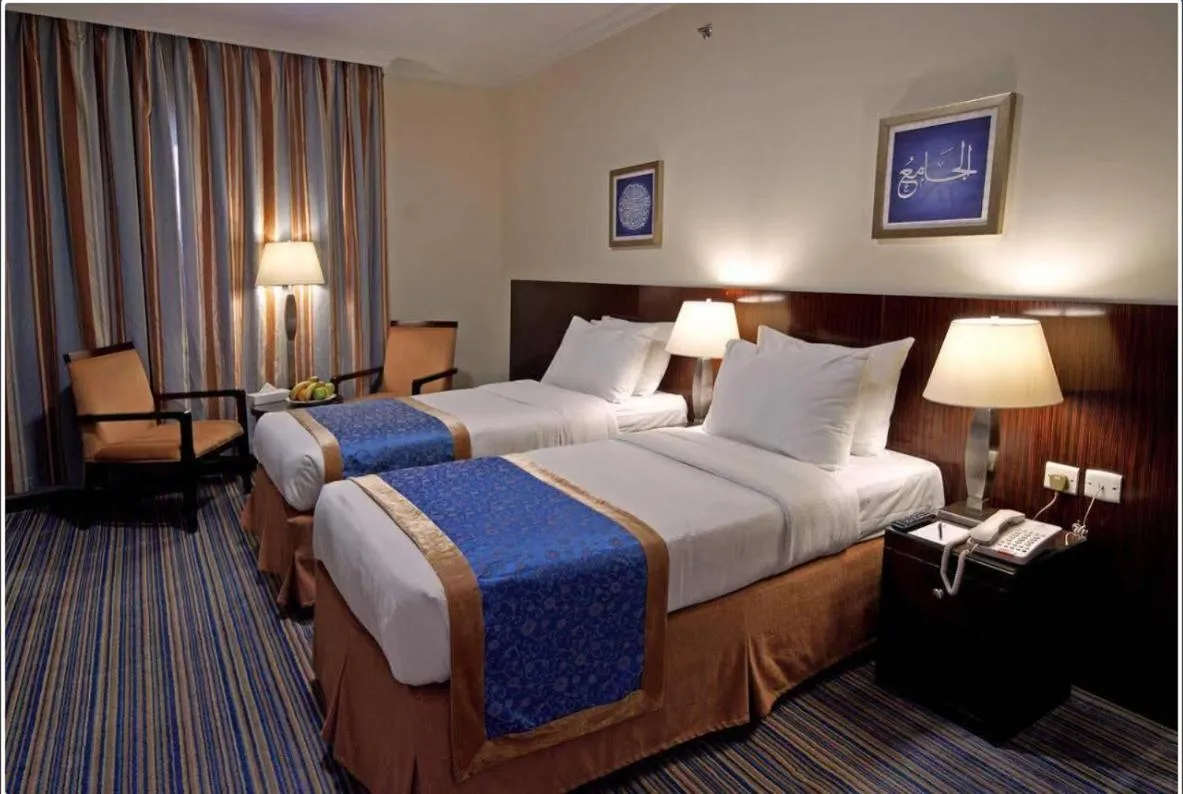 Bed in Arkan Al Manar Hotel
