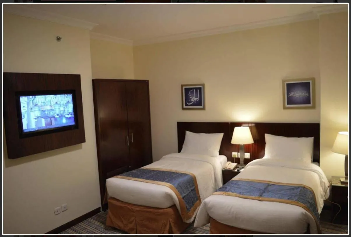 Bed in Arkan Al Manar Hotel