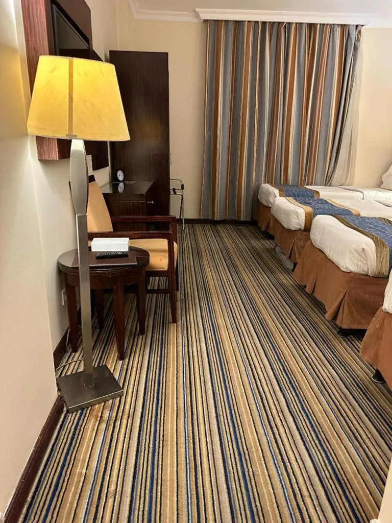 Bed in Arkan Al Manar Hotel