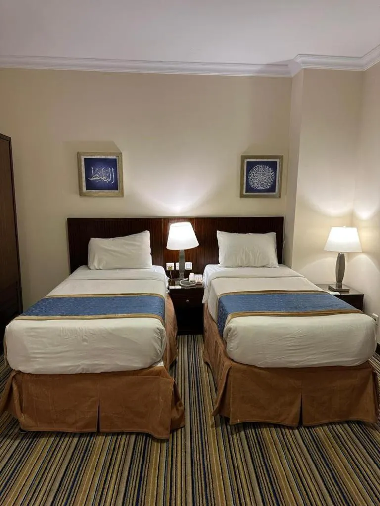 Bed in Arkan Al Manar Hotel