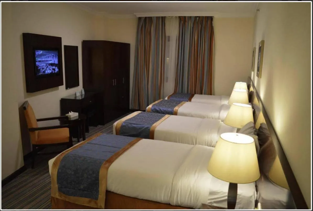 Bed in Arkan Al Manar Hotel