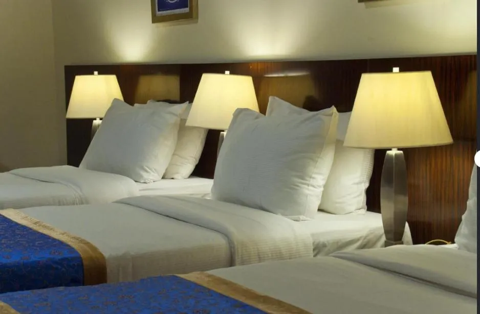 Bed in Arkan Al Manar Hotel