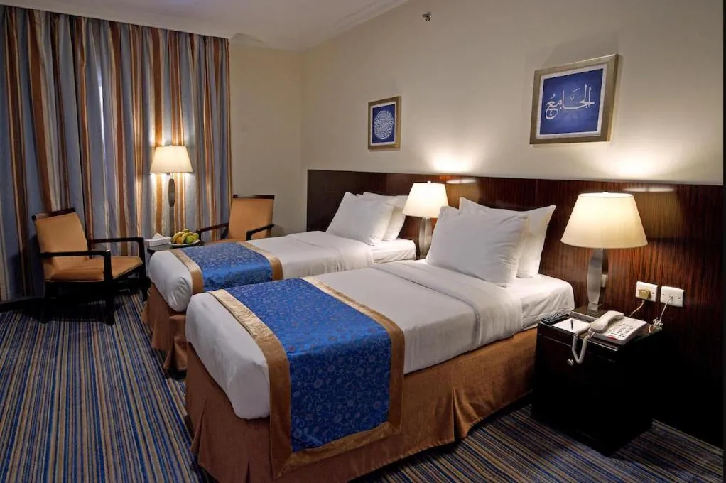 Bed in Arkan Al Manar Hotel