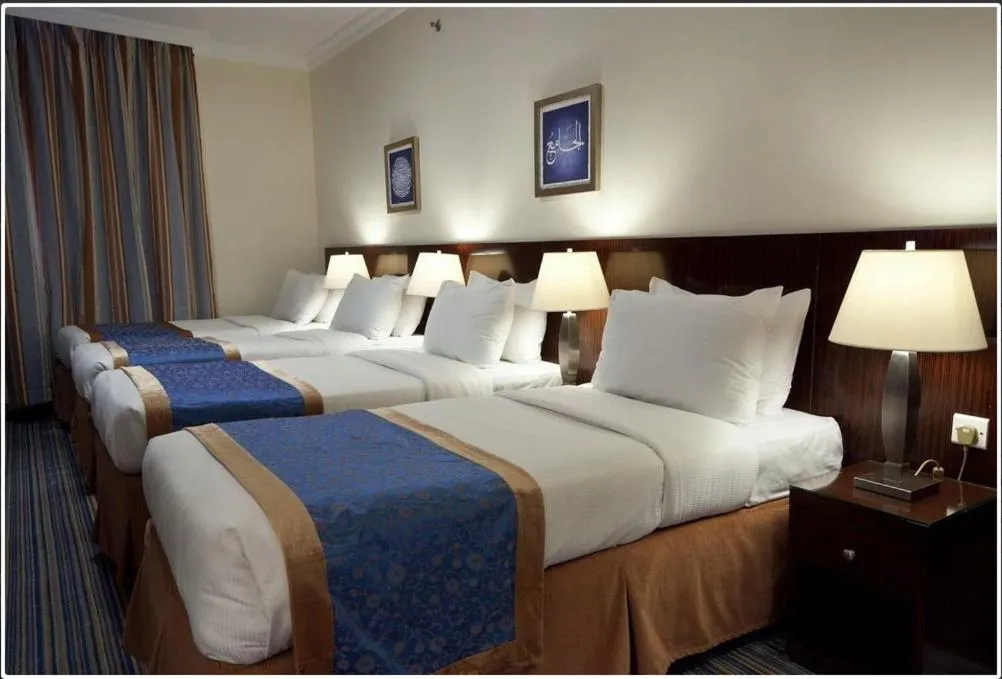 Bed in Arkan Al Manar Hotel