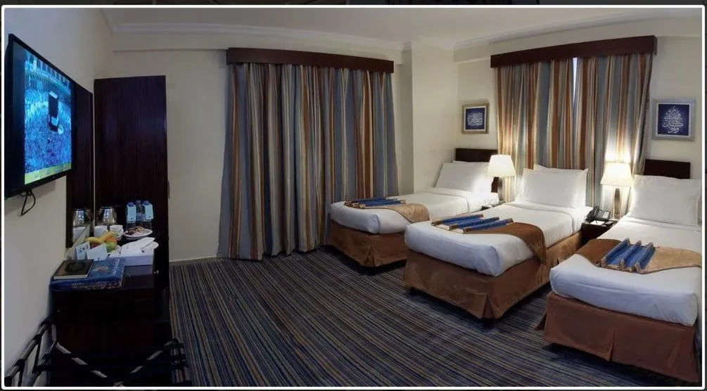Bed in Arkan Al Manar Hotel