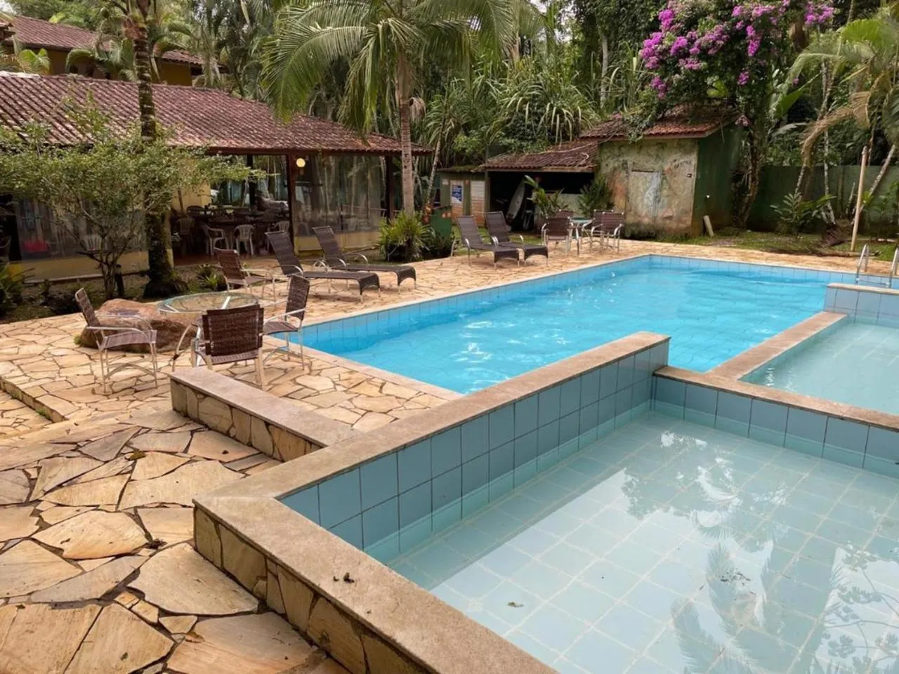 Swimming pool in Pousada Canto de Itamambuca