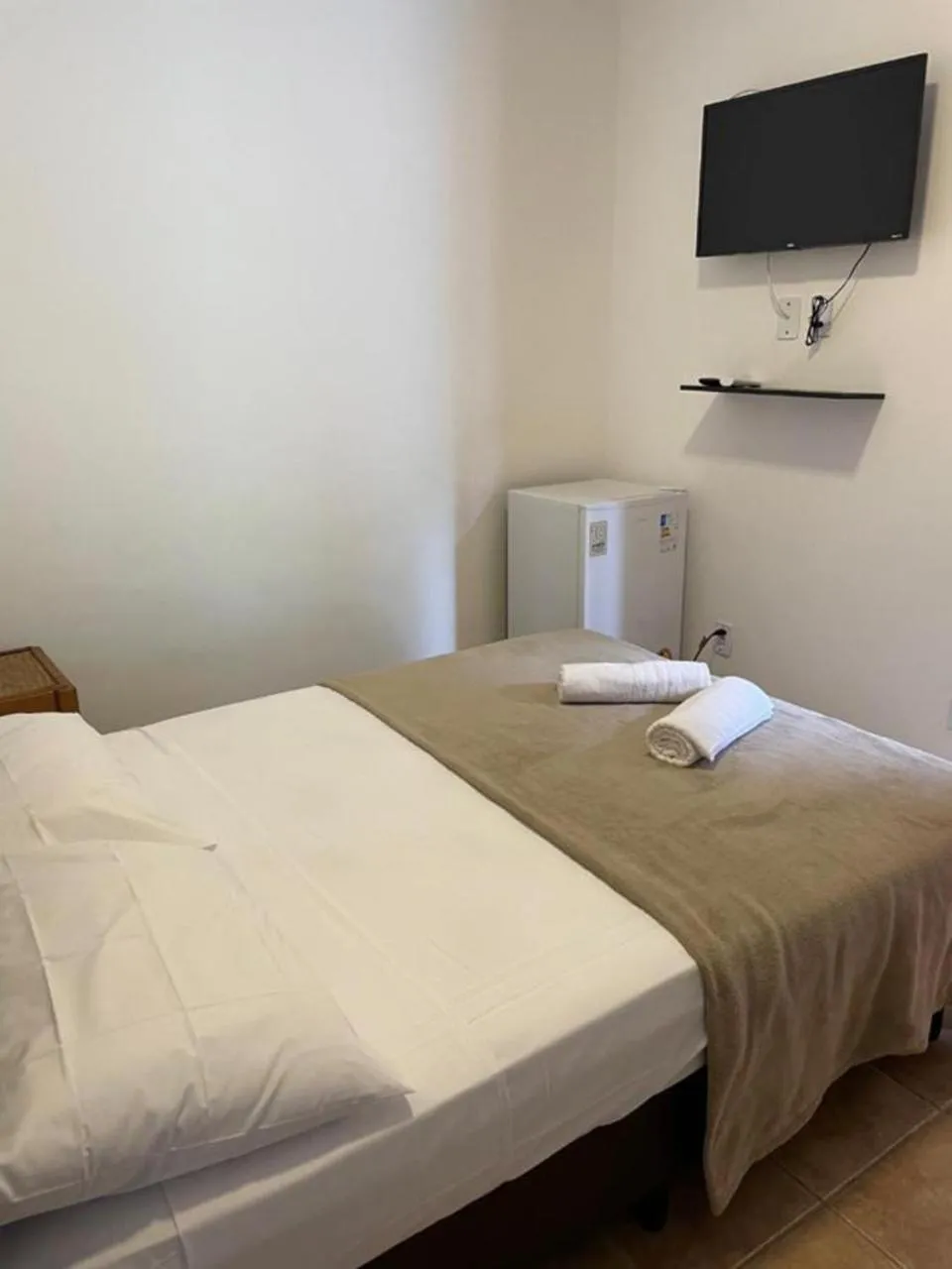 Photo of the whole room, Bed in Pousada Canto de Itamambuca
