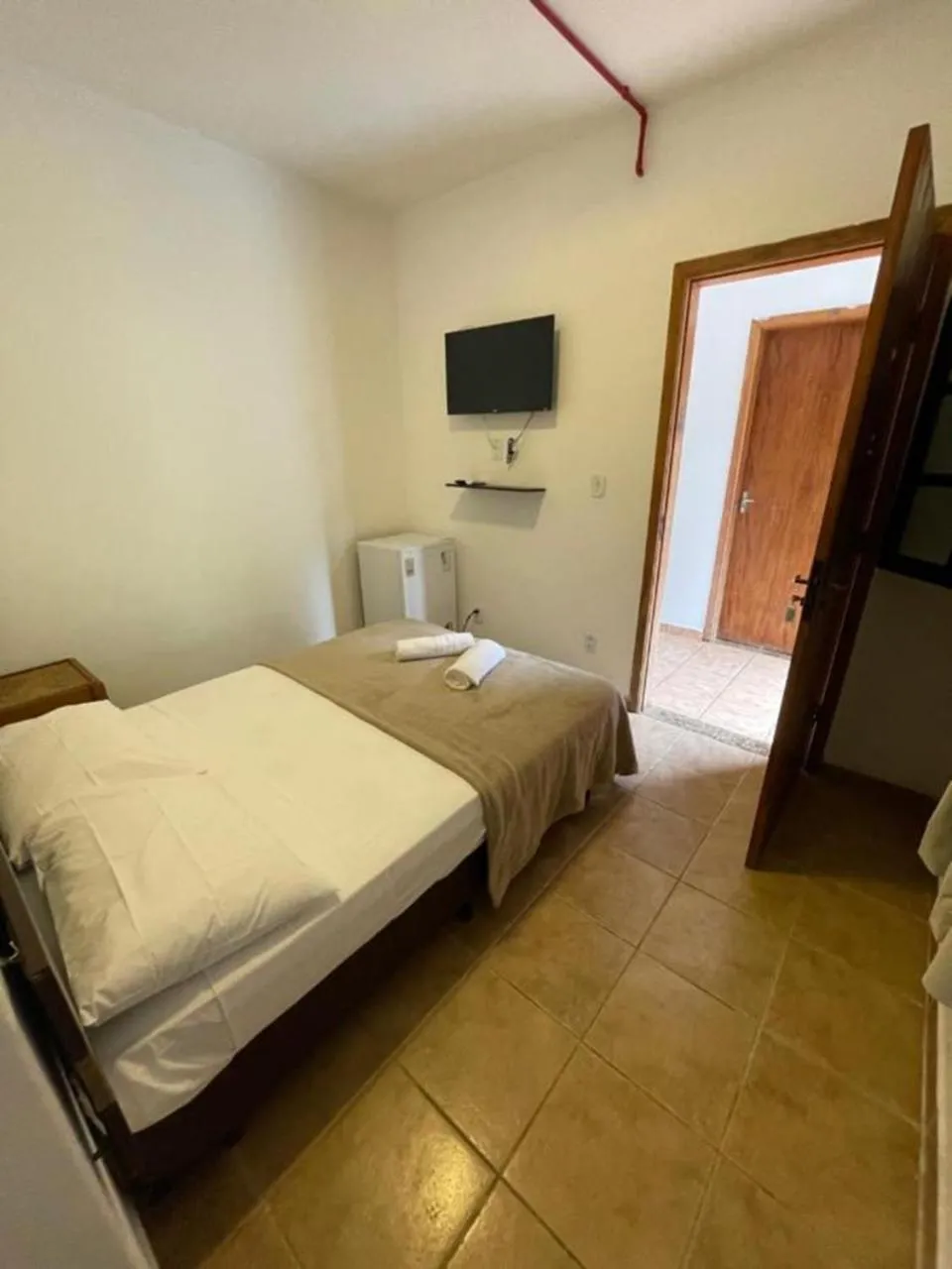 Photo of the whole room, Bed in Pousada Canto de Itamambuca