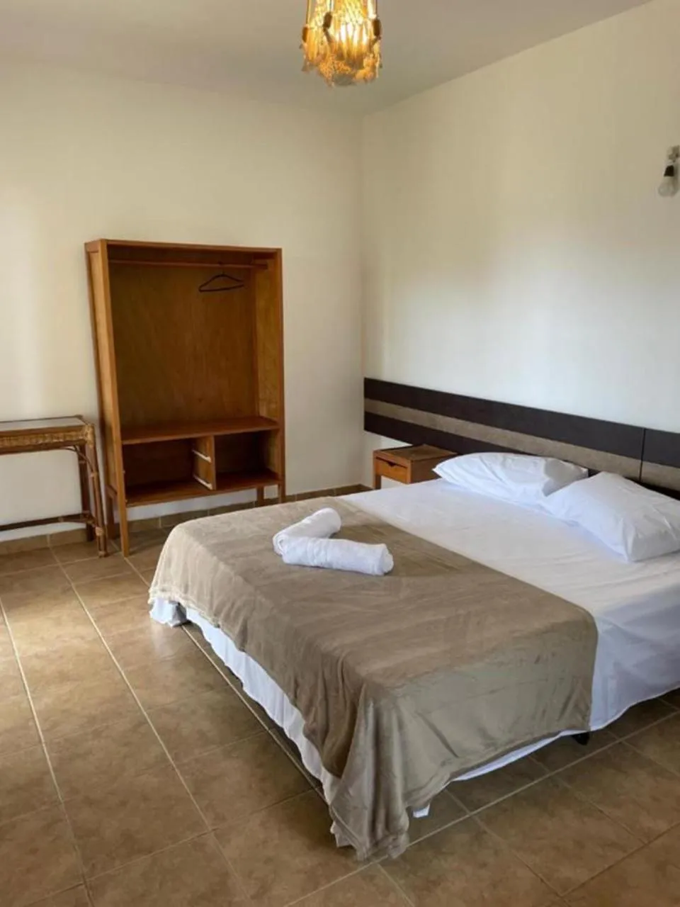 Photo of the whole room, Bed in Pousada Canto de Itamambuca
