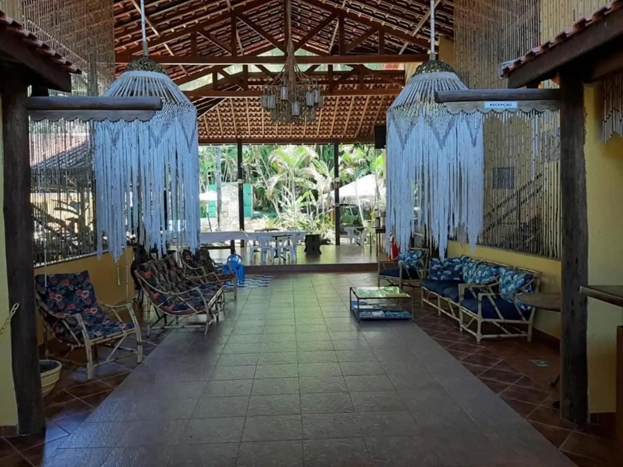 Seating area in Pousada Canto de Itamambuca