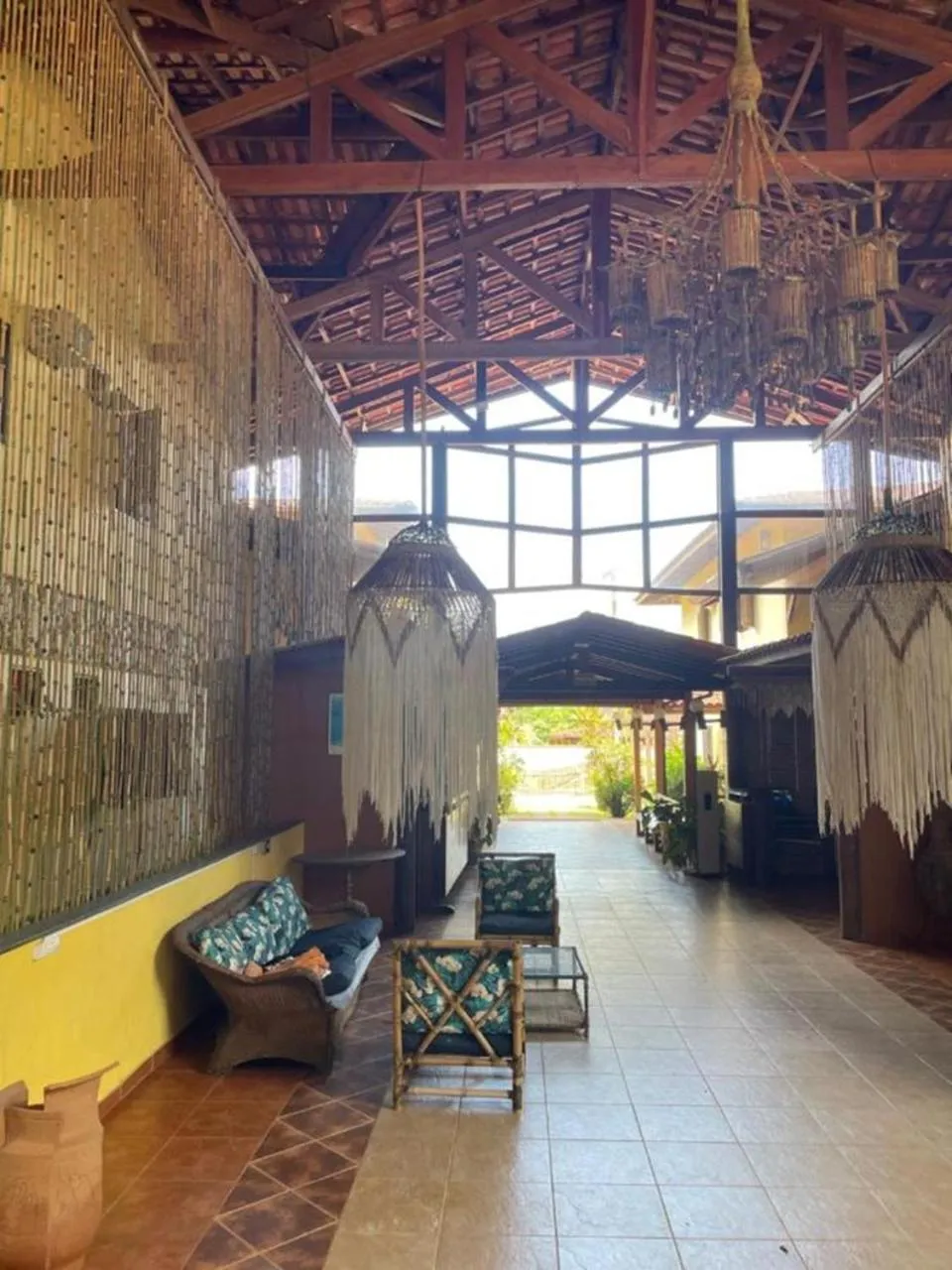 Seating area in Pousada Canto de Itamambuca