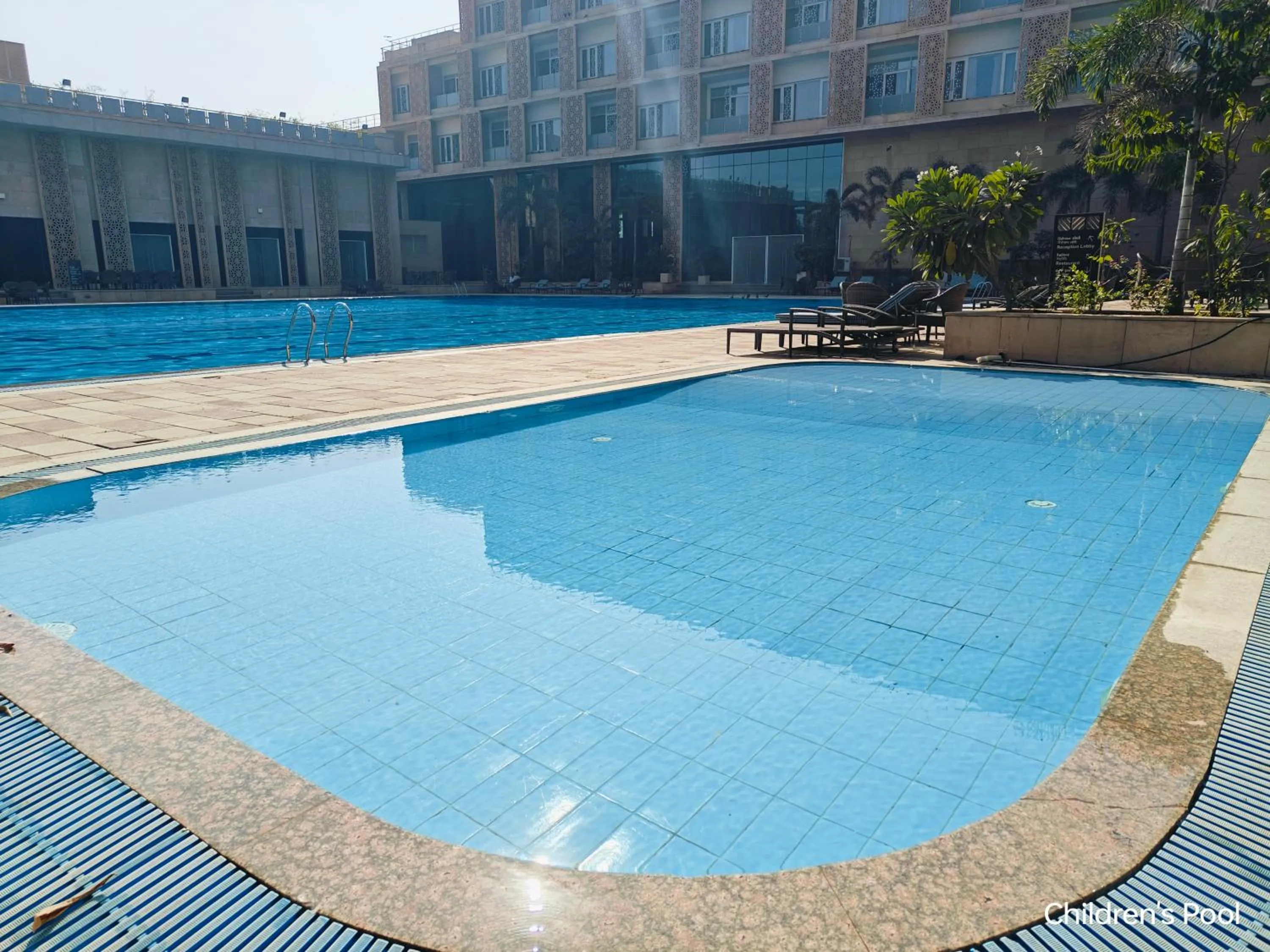 Swimming pool in Ramada by Wyndham Ahmedabad Narendra Modi Stadium Motera