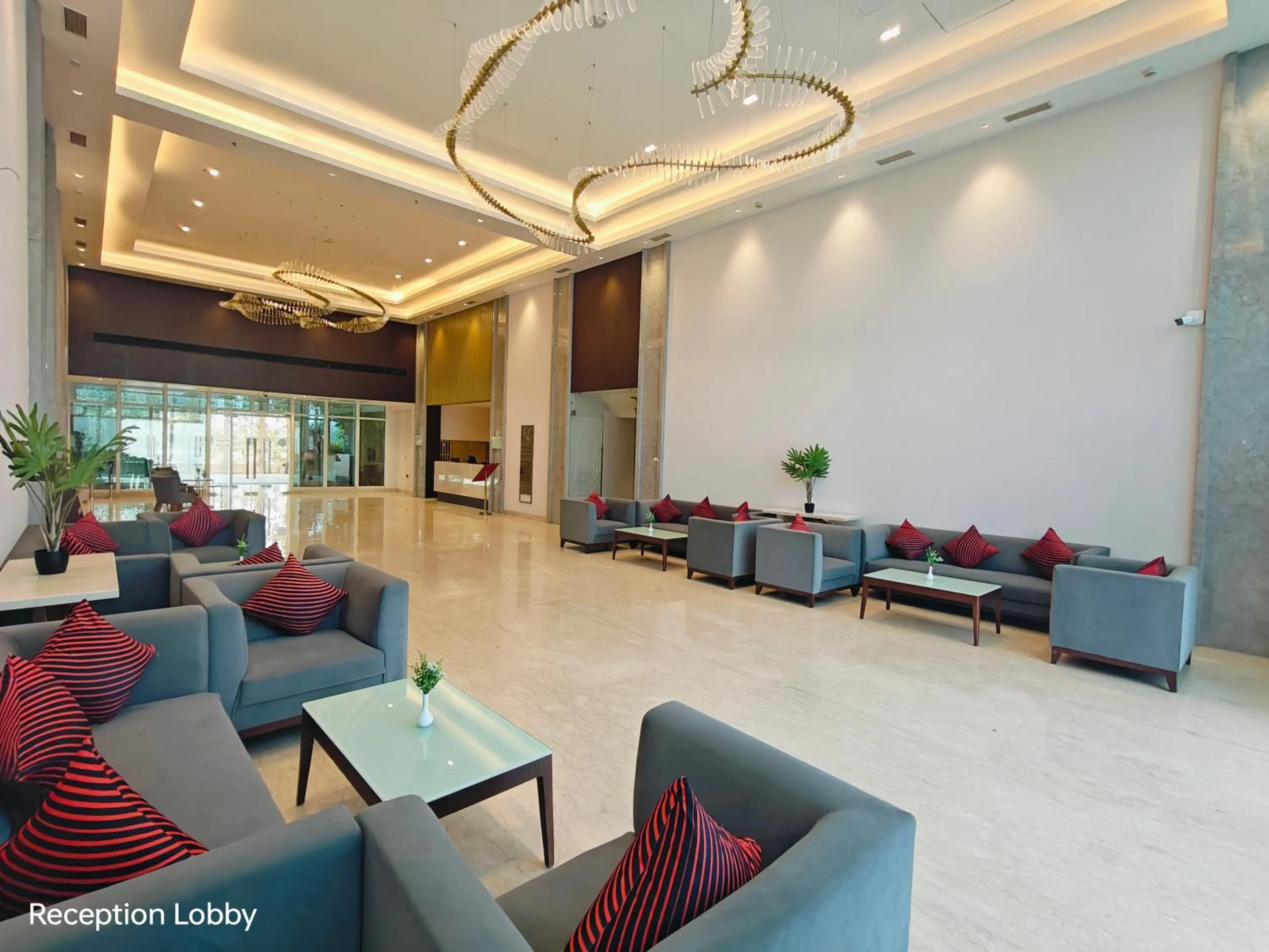 Seating area in Ramada by Wyndham Ahmedabad Narendra Modi Stadium Motera