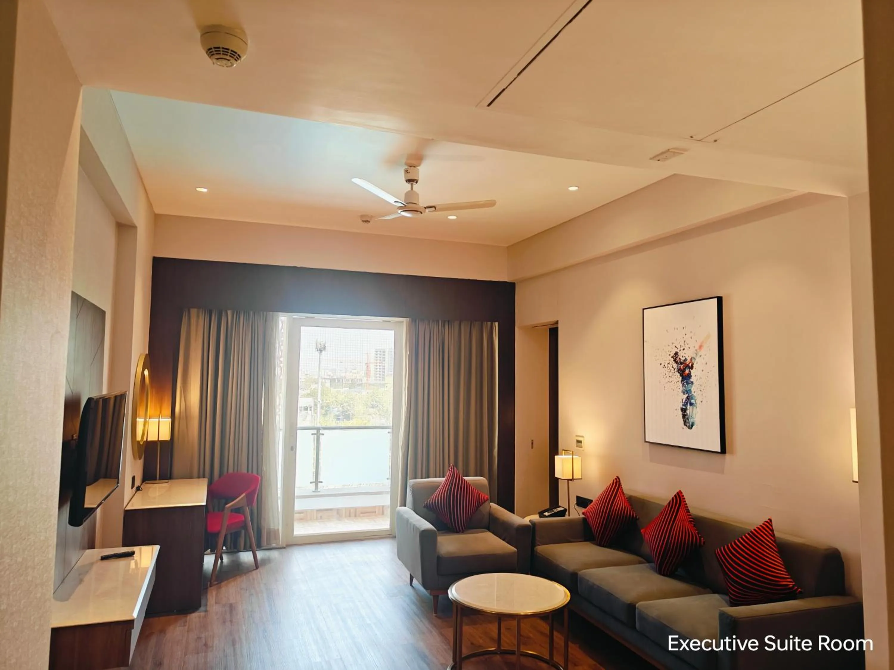 Living room in Ramada by Wyndham Ahmedabad Narendra Modi Stadium Motera