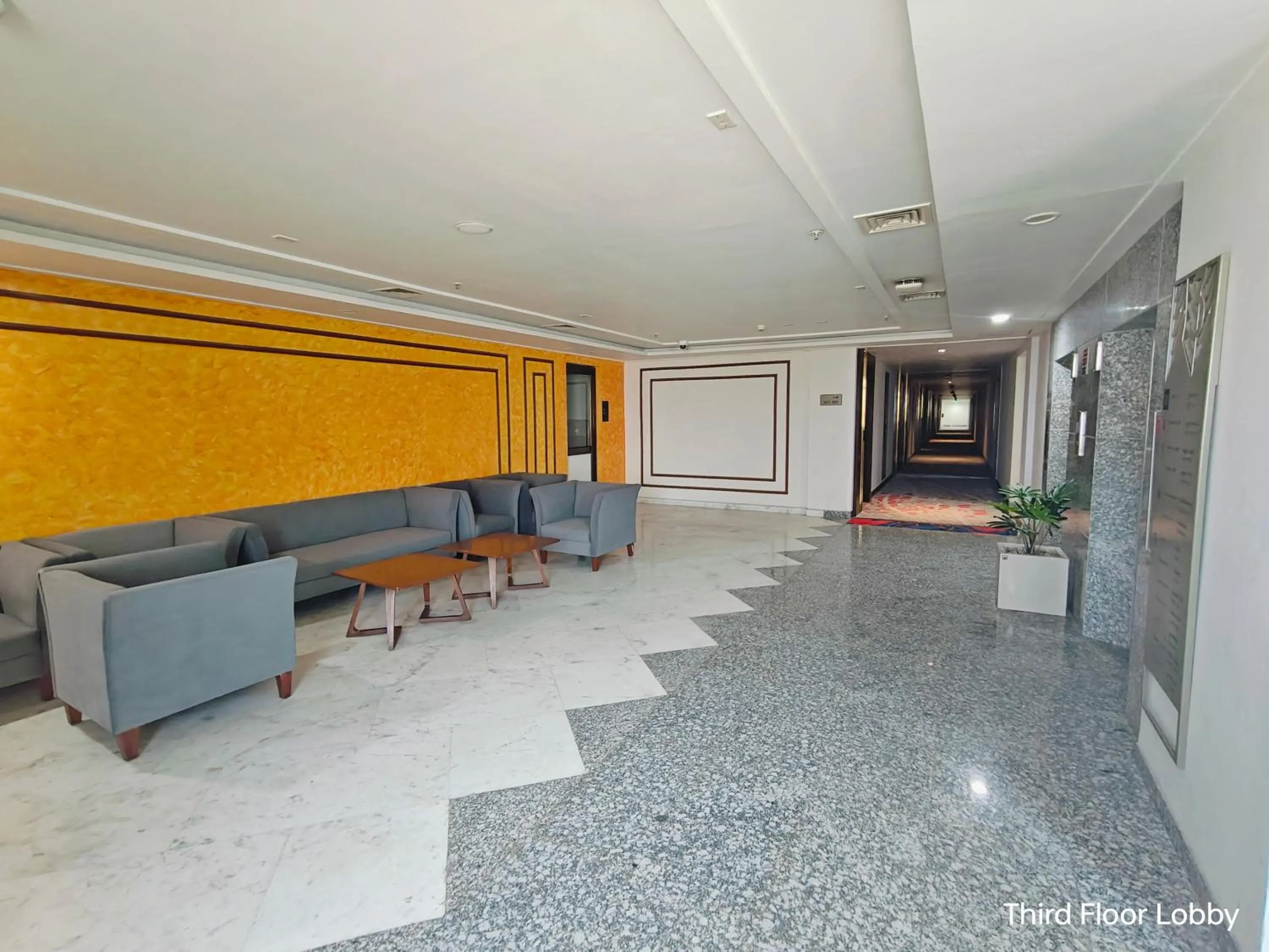 Seating area in Ramada by Wyndham Ahmedabad Narendra Modi Stadium Motera