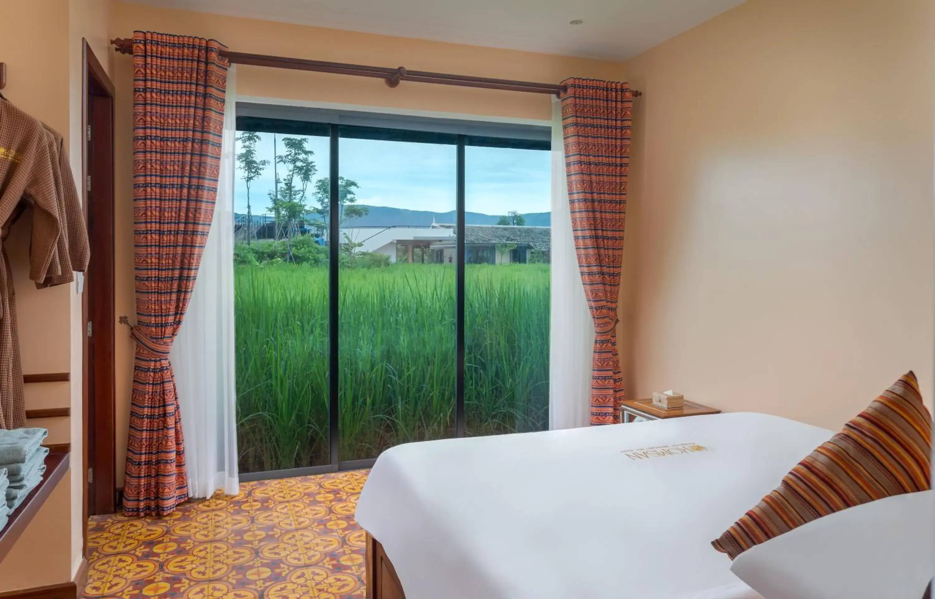 Bed in Komsan Kampot Resort Bed in Komsan Kampot Resort