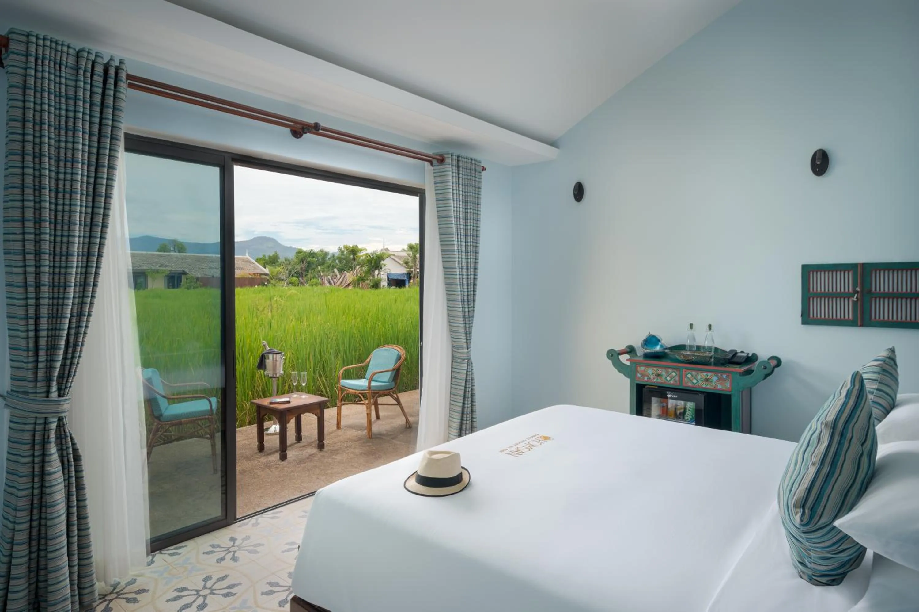 Bed in Komsan Kampot Resort