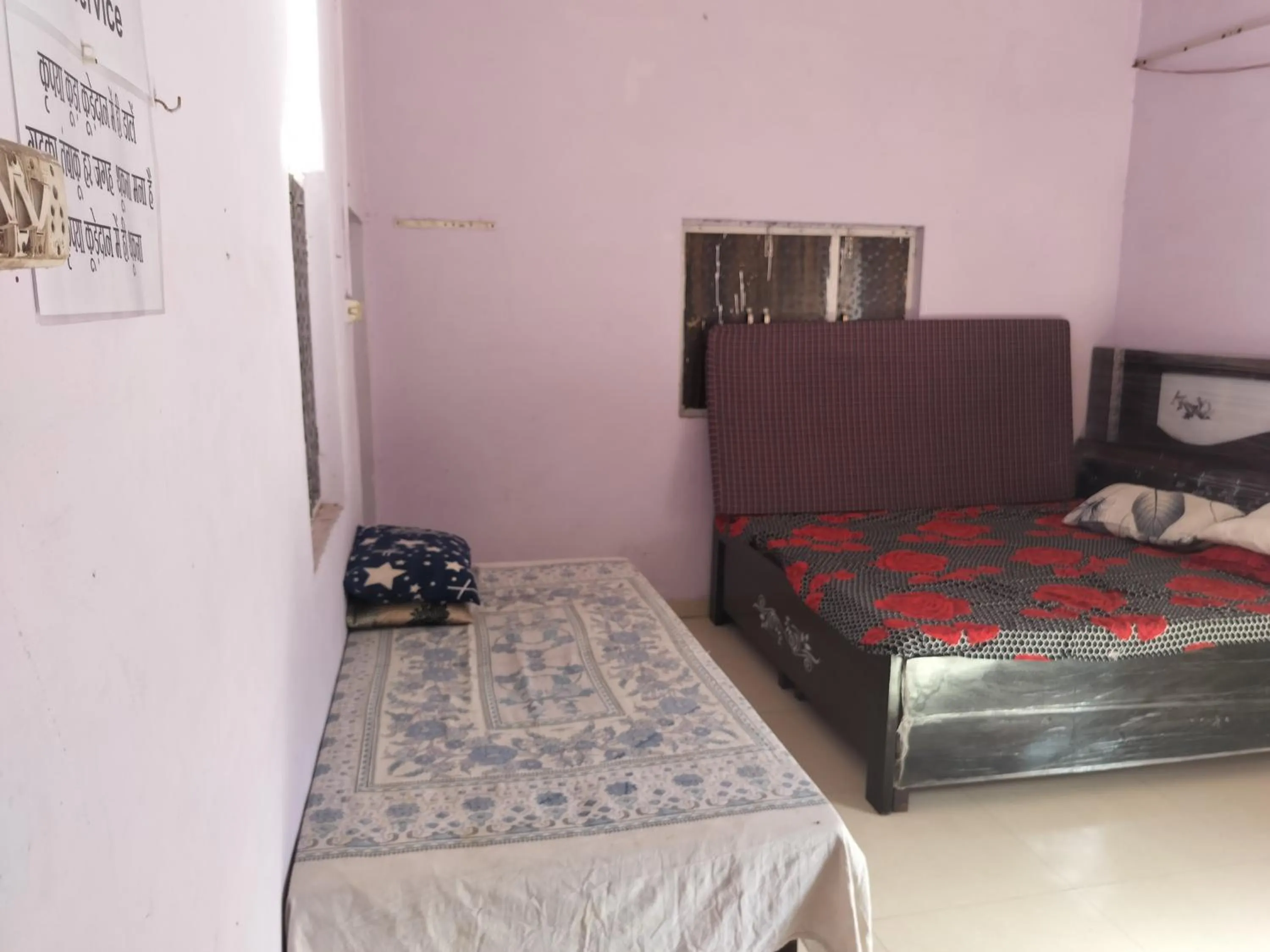 Bed in Shri Krishna Kunj homestay