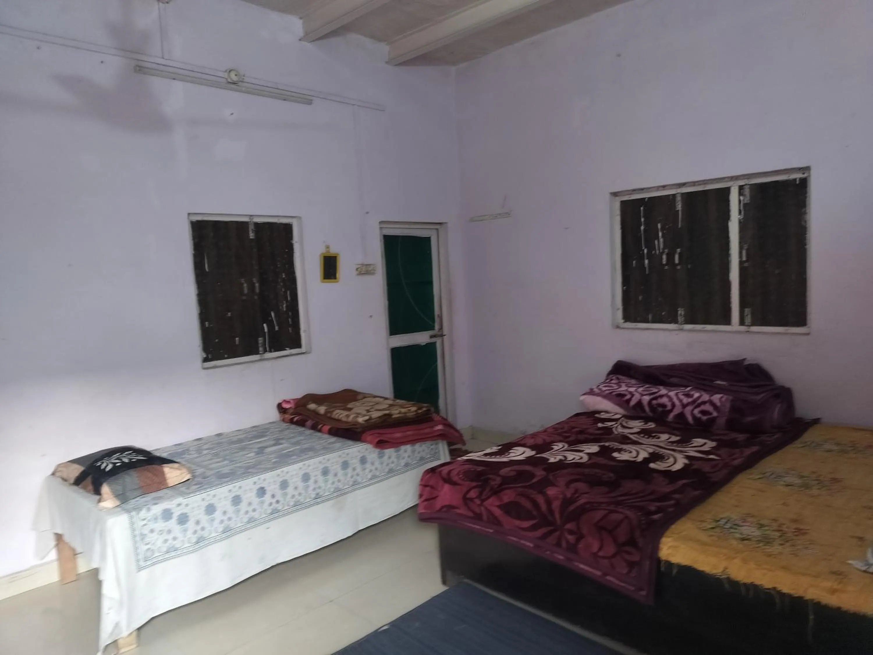 Bed in Shri Krishna Kunj homestay