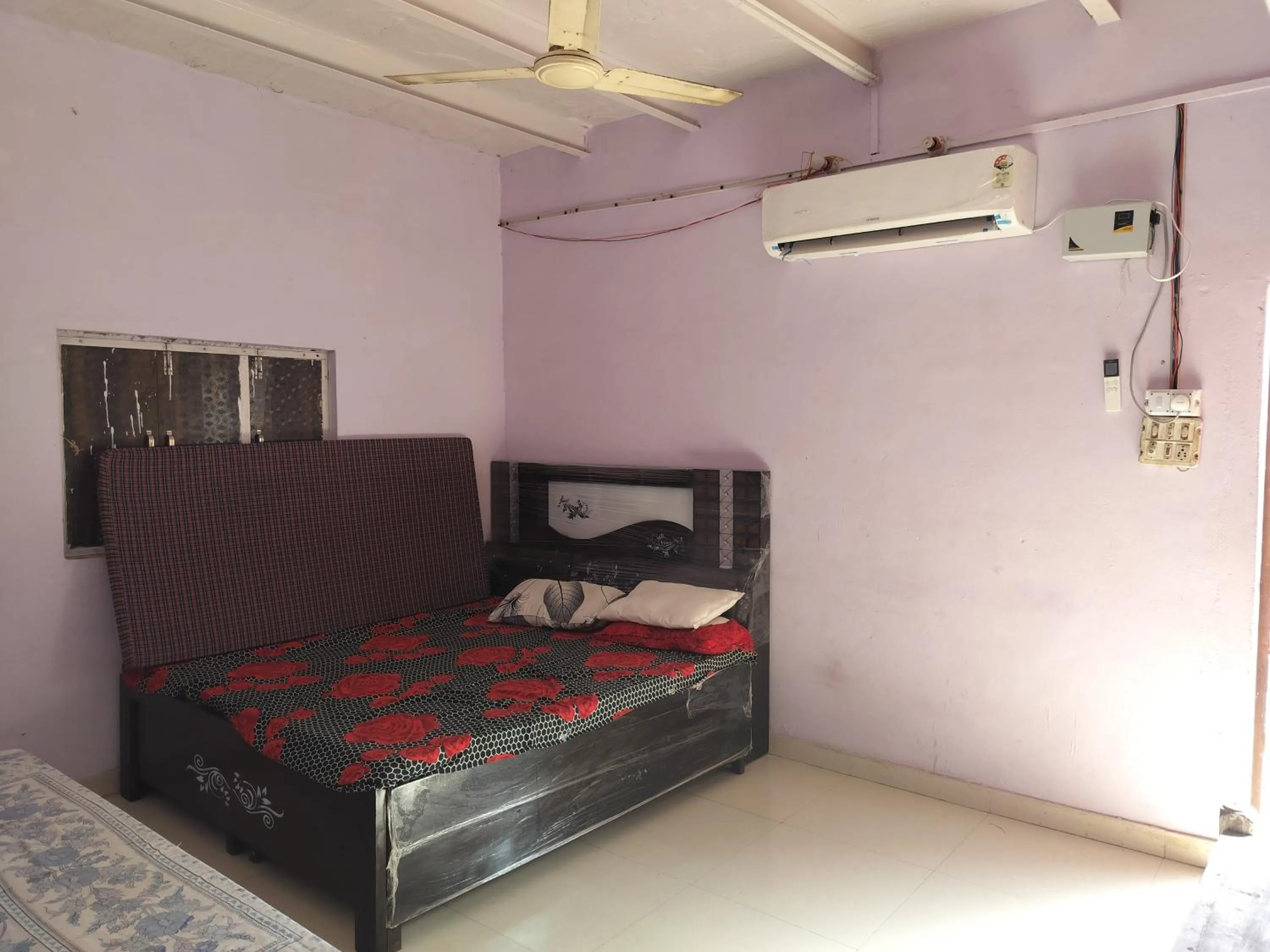 Bed in Shri Krishna Kunj homestay