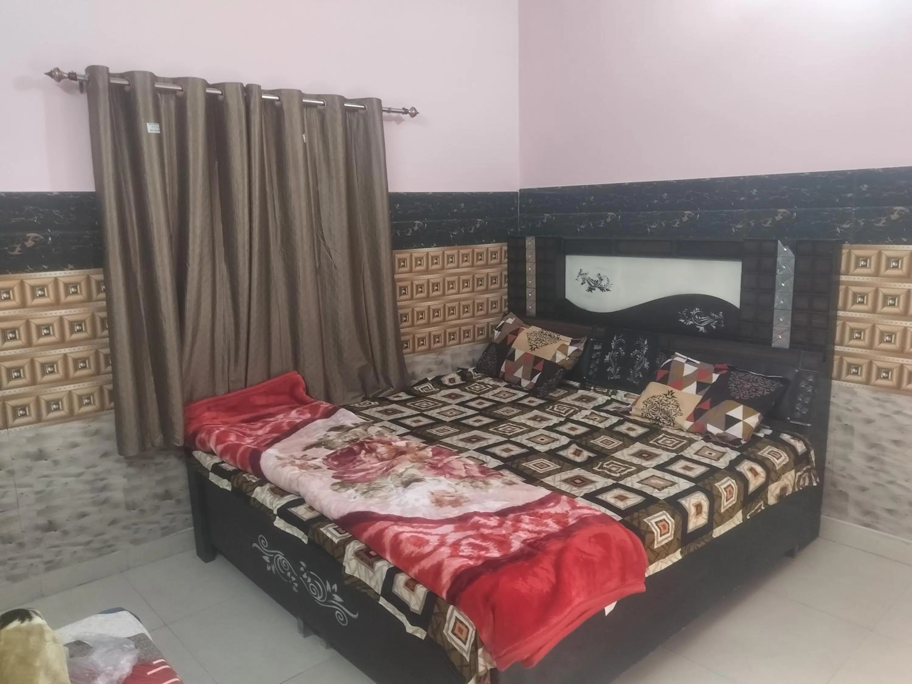 Bed in Shri Krishna Kunj homestay