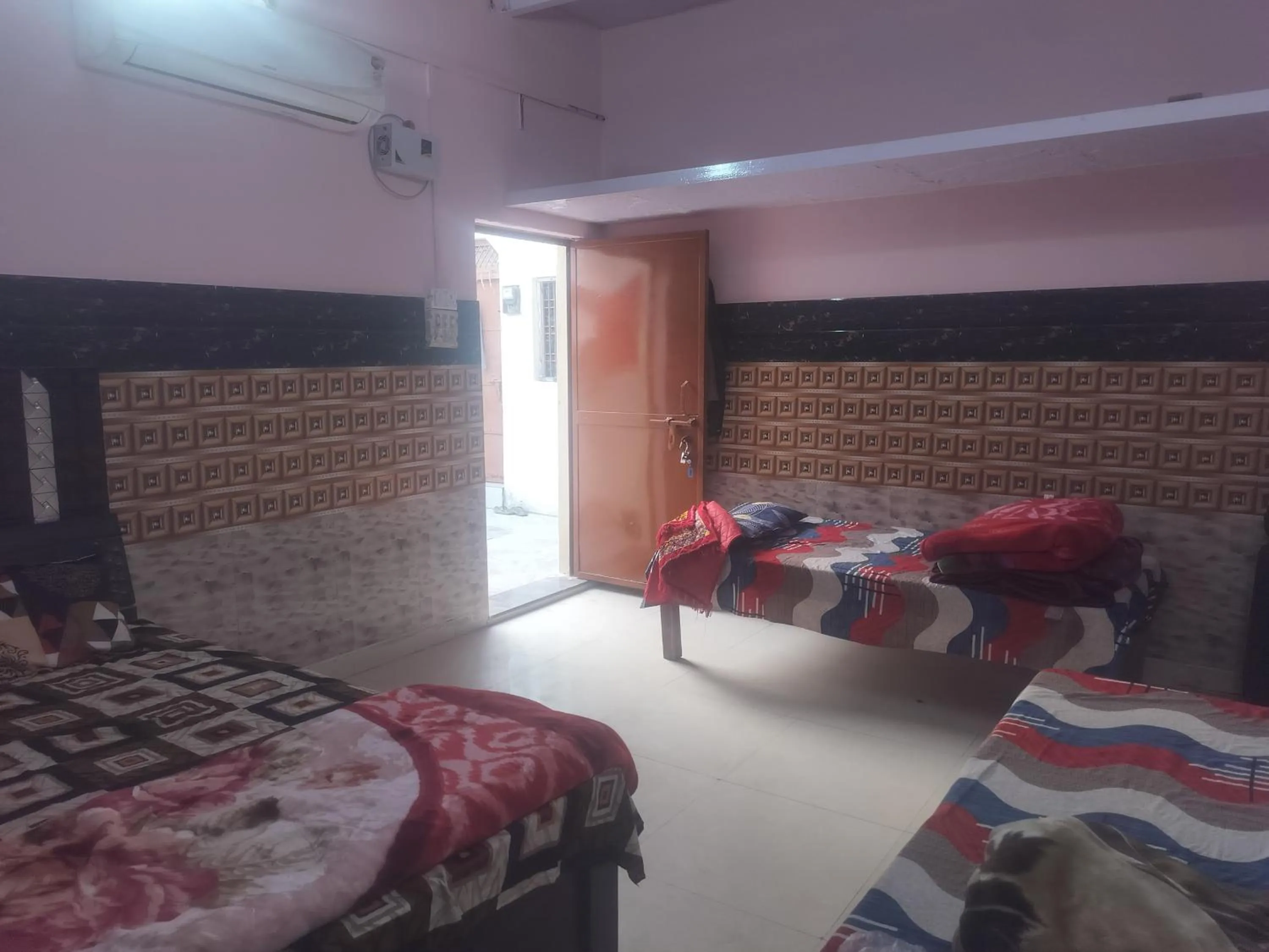 Bed in Shri Krishna Kunj homestay