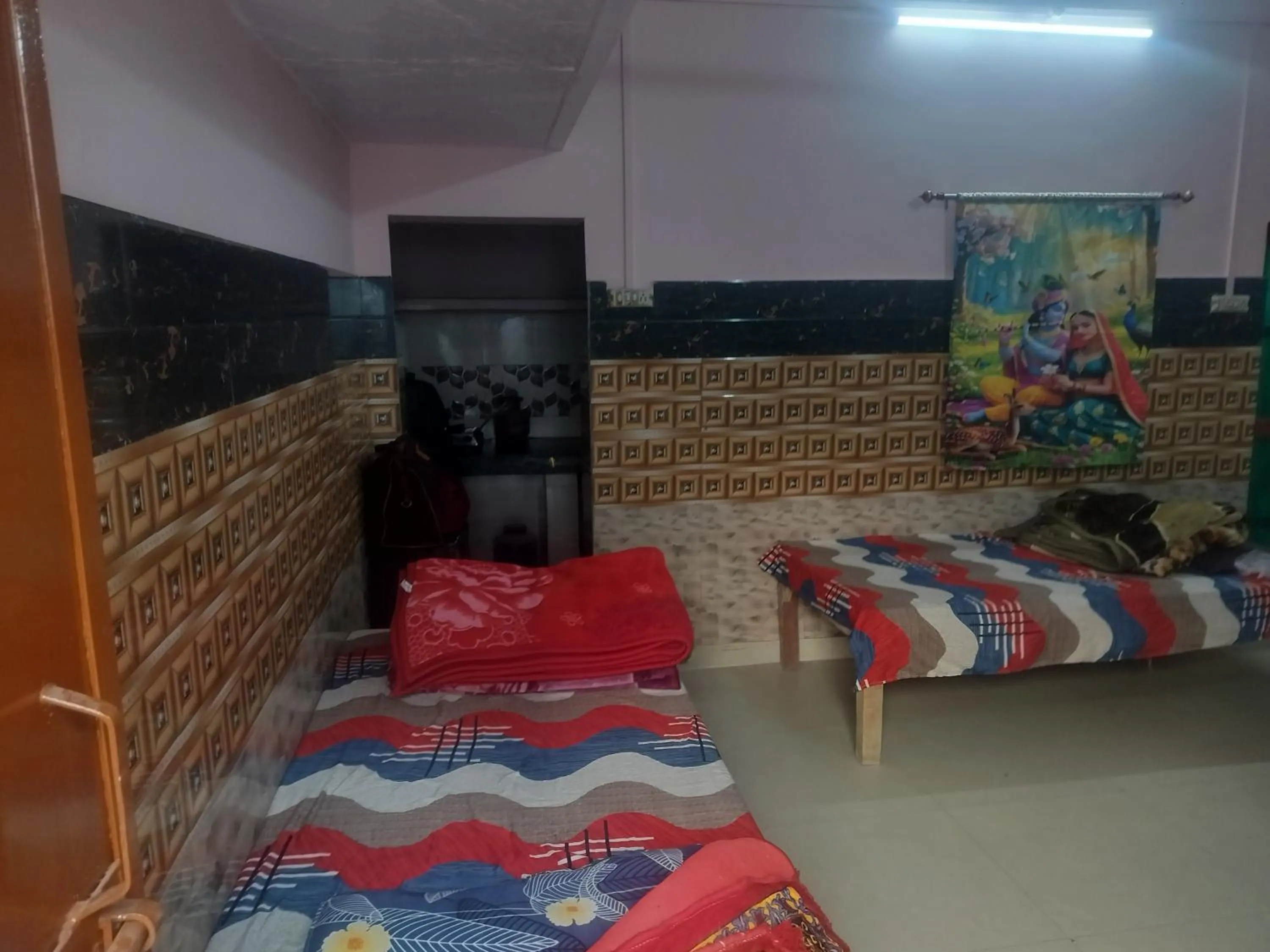 Bed in Shri Krishna Kunj homestay