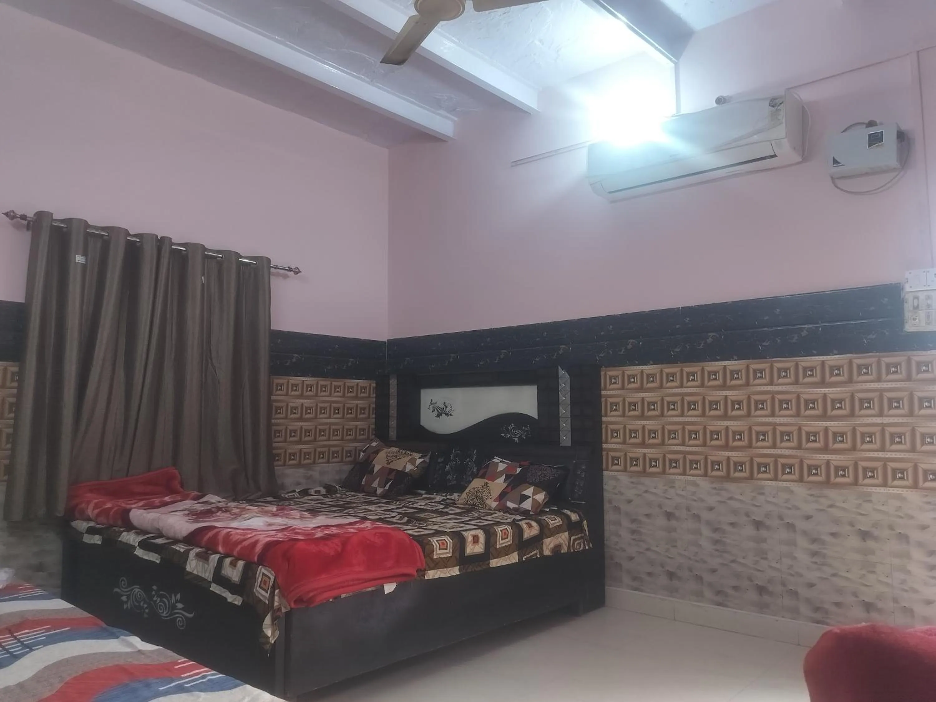 Bed in Shri Krishna Kunj homestay
