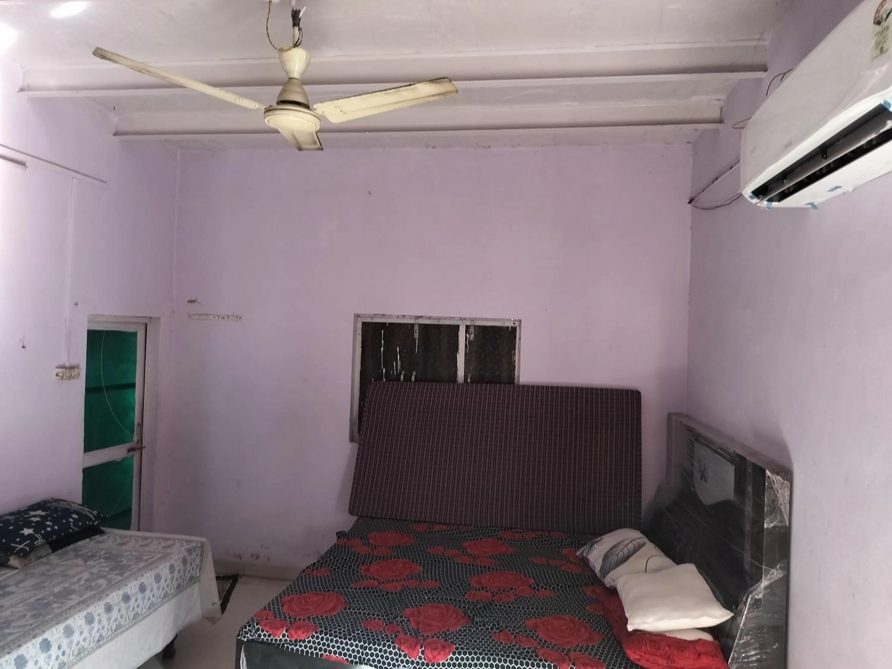 Bed in Shri Krishna Kunj homestay