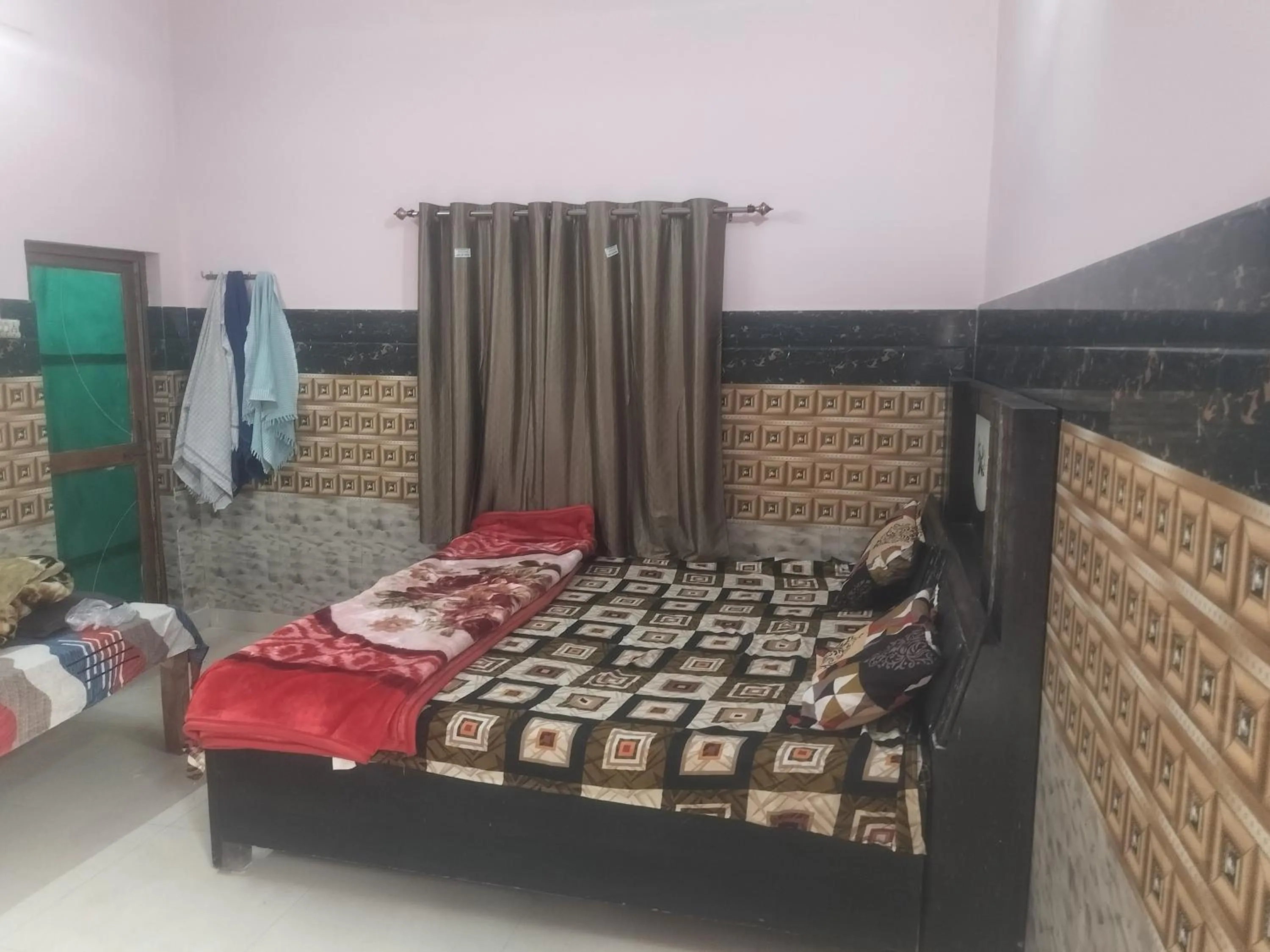 Bed in Shri Krishna Kunj homestay