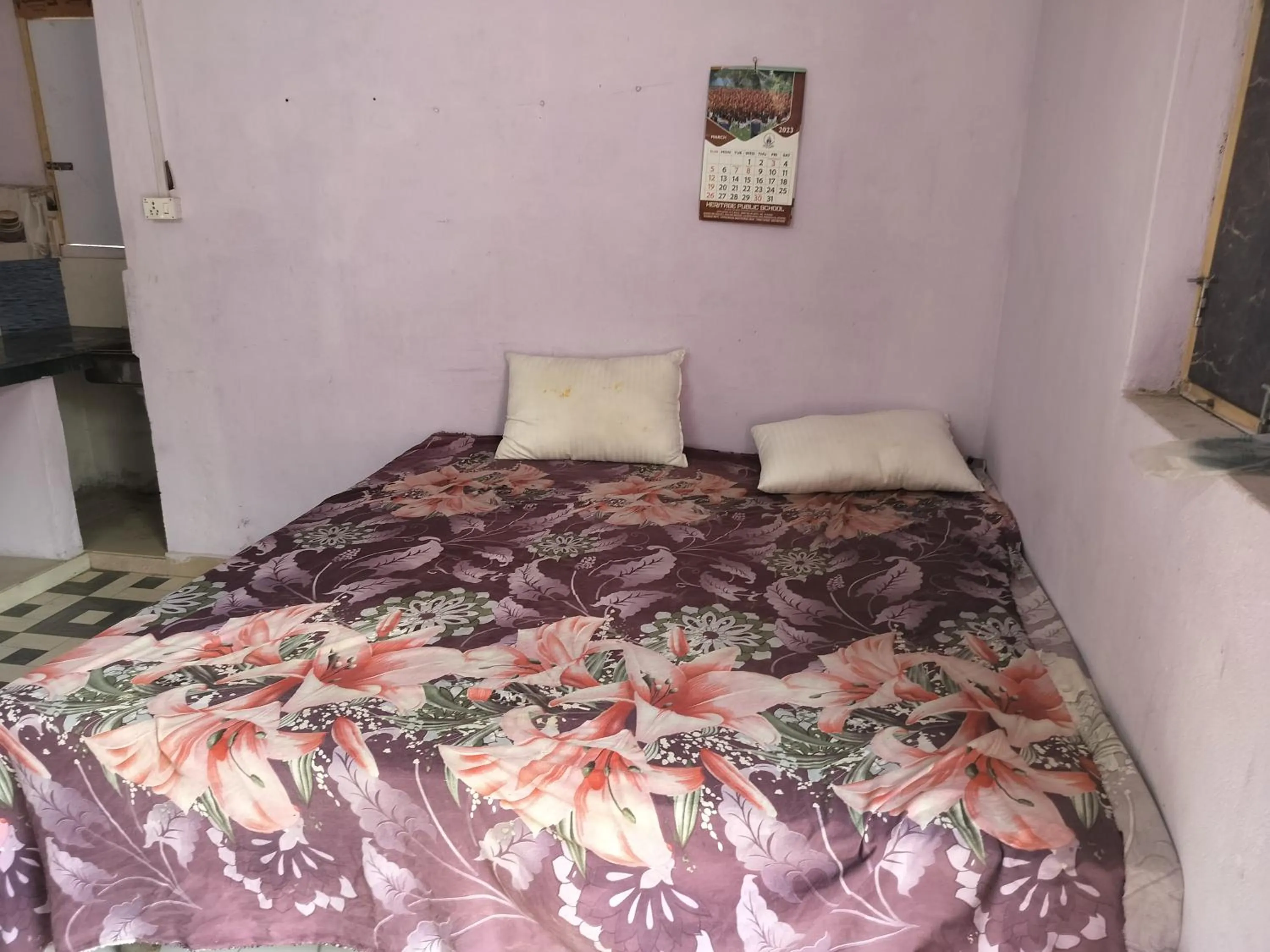 Bed in Shri Krishna Kunj homestay