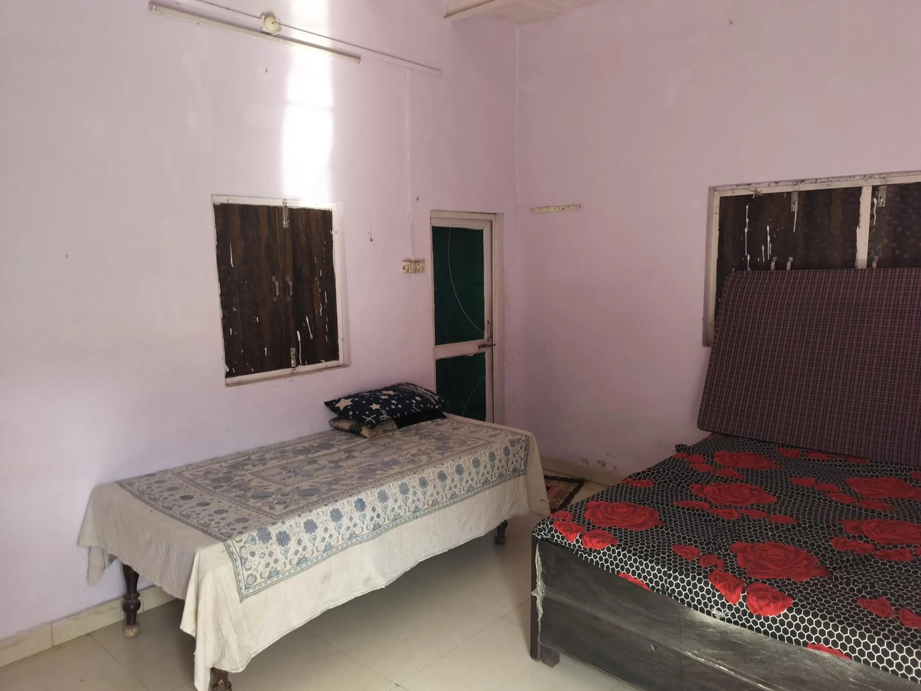 Bed in Shri Krishna Kunj homestay