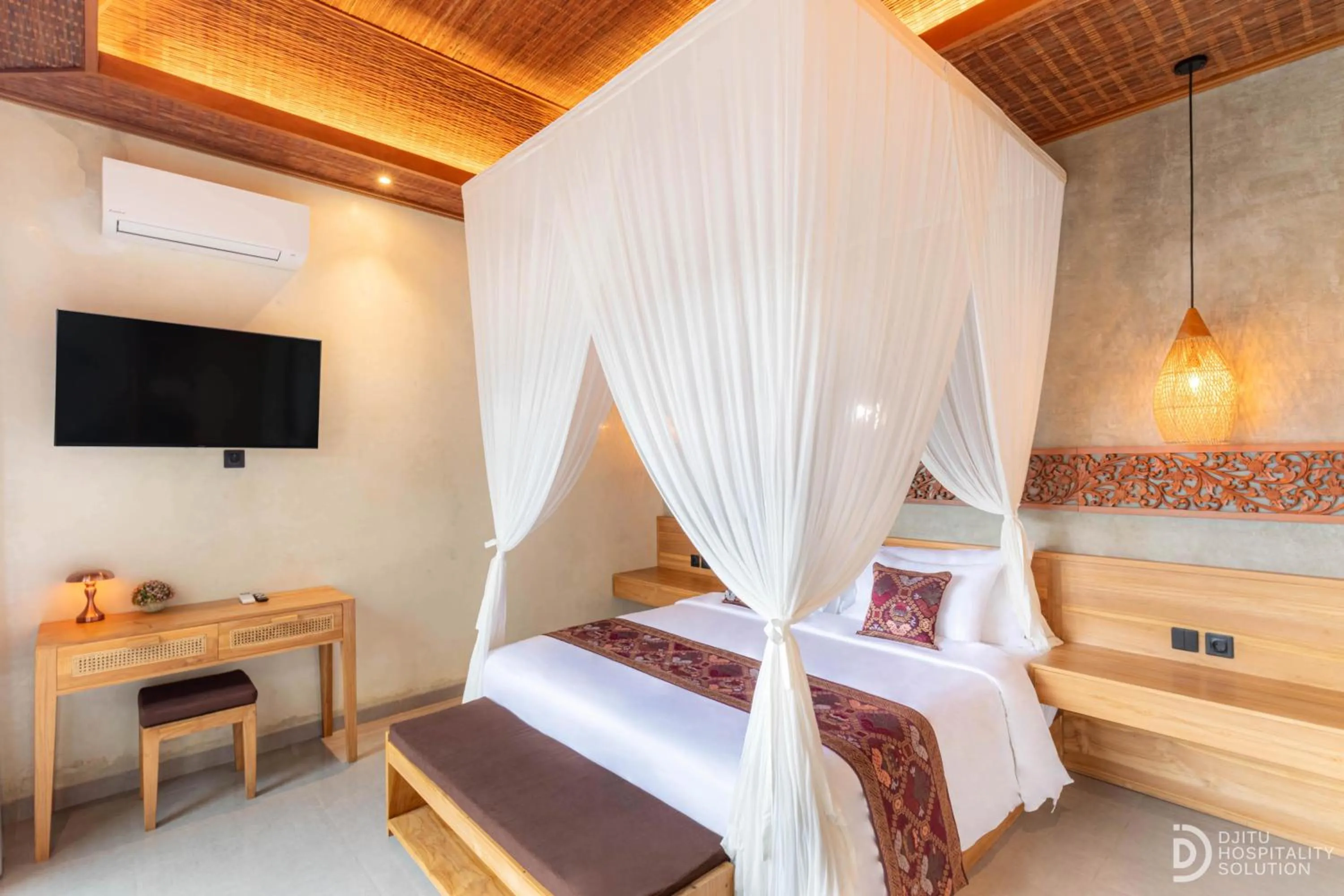 Bathroom, Bed in Weda Villas