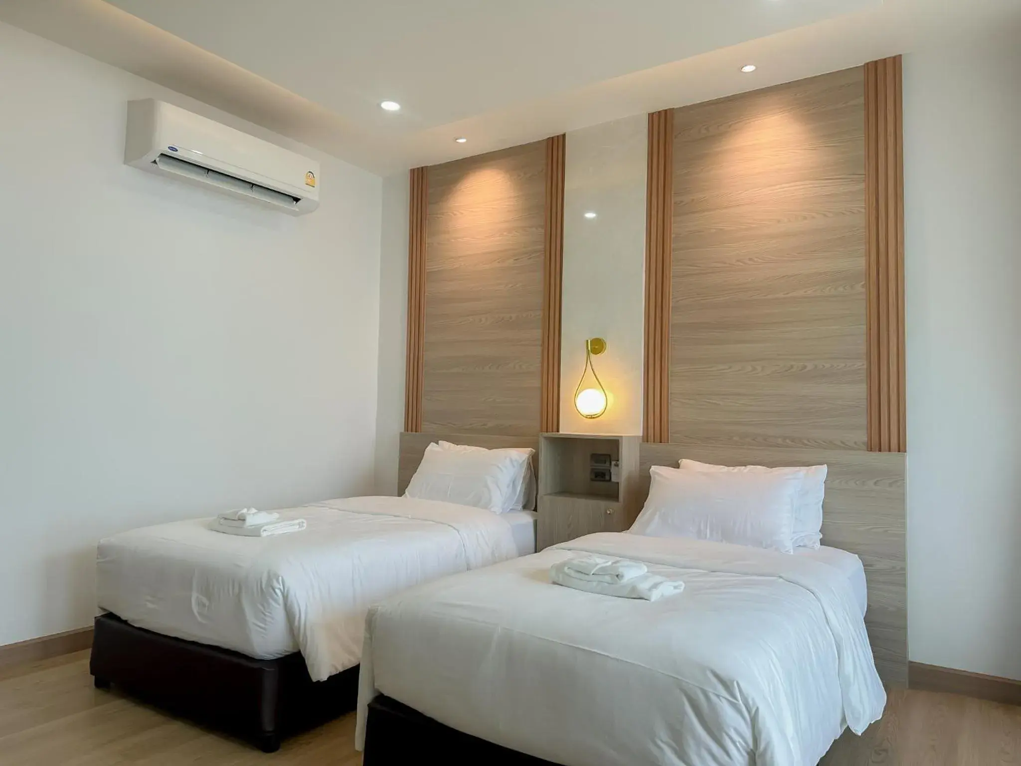 Bed in 2SIS'S Khanom Resotel Bed in 2SIS'S Khanom Resotel