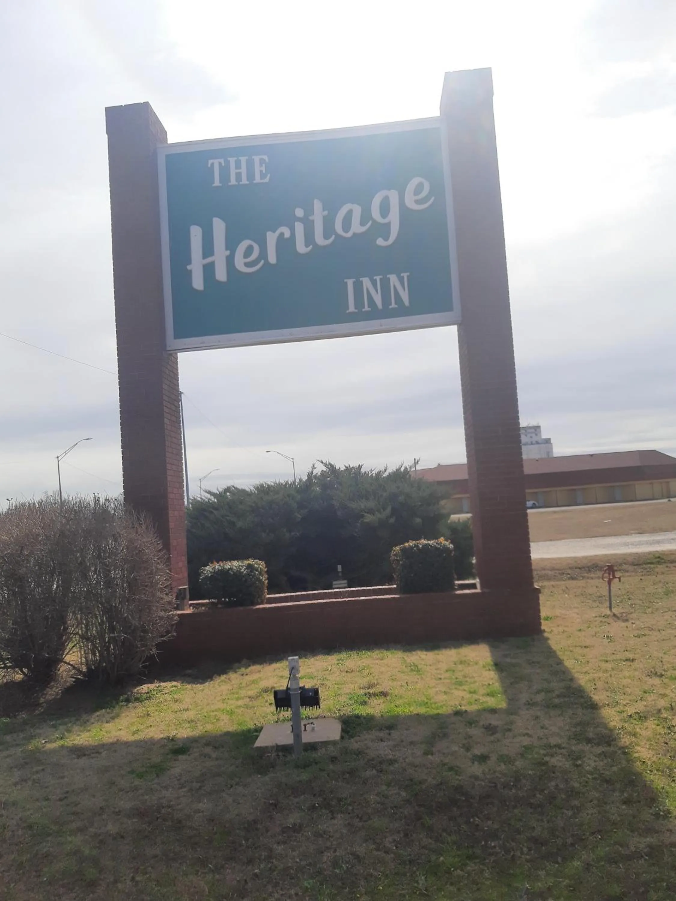 Property logo or sign in Heritage Inn