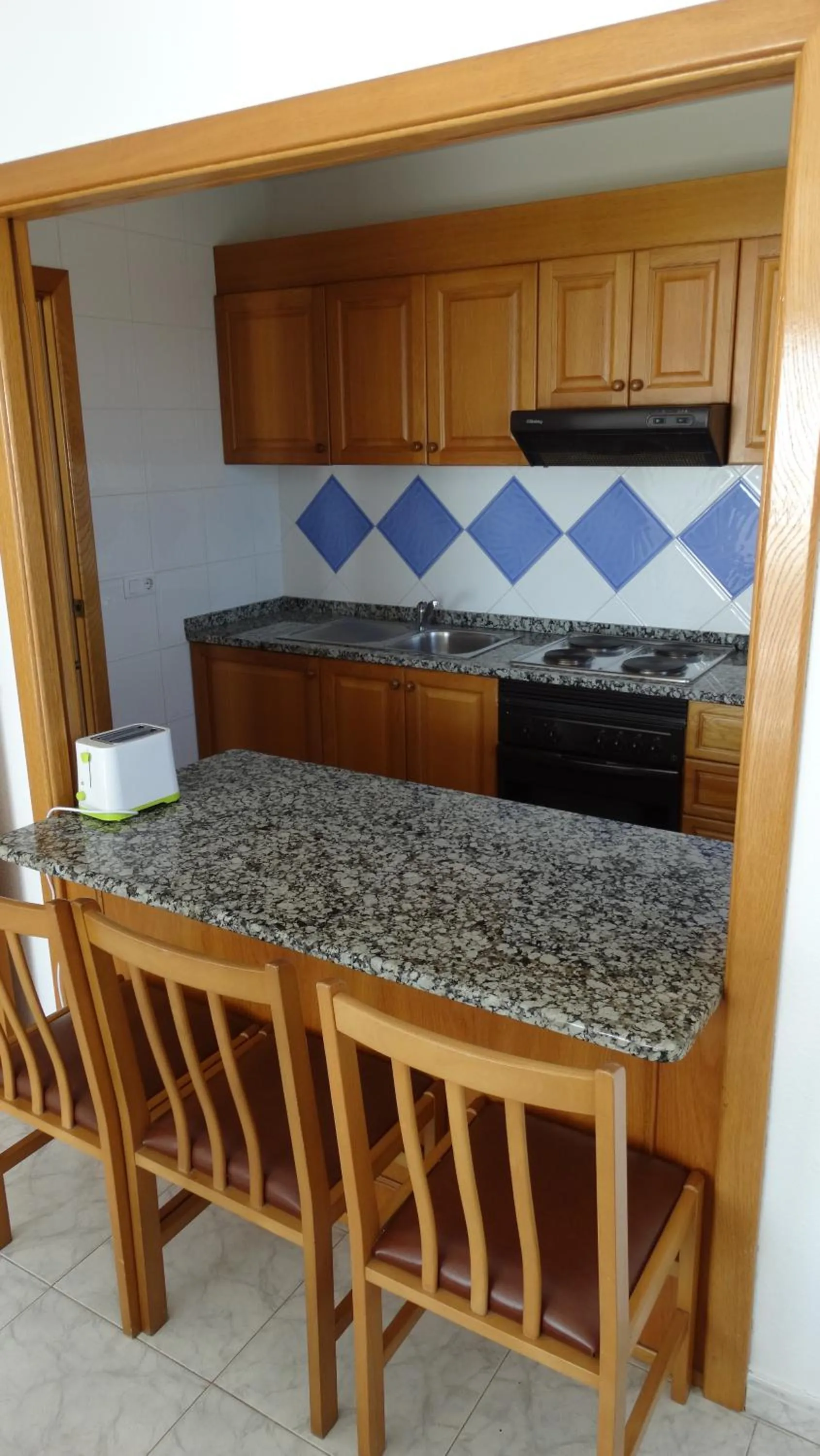Kitchen or kitchenette in Apartamentos Beni-Beach