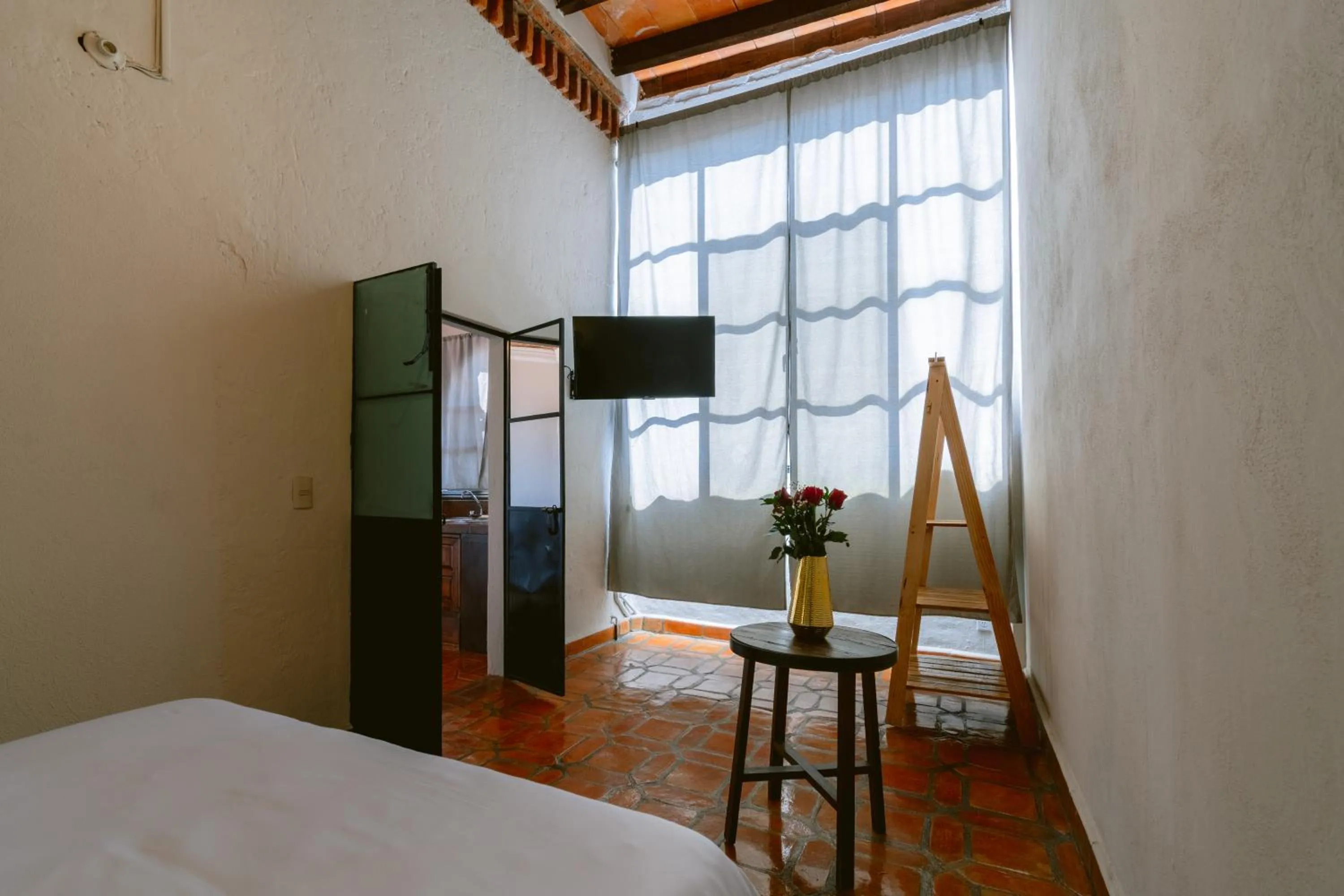 Photo of the whole room, Bed in Te Amo Hotel Boutique