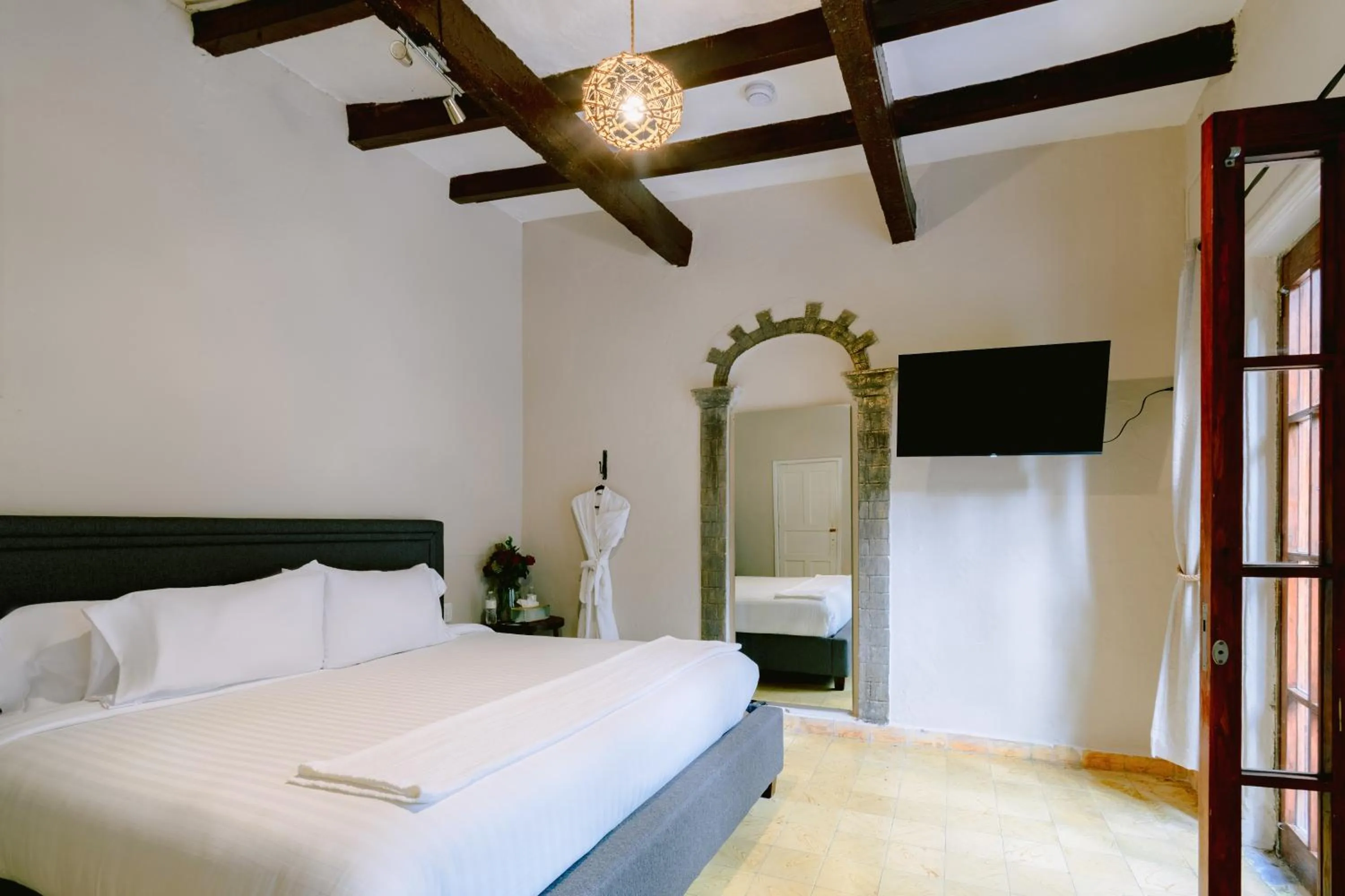 Photo of the whole room, Bed in Te Amo Hotel Boutique