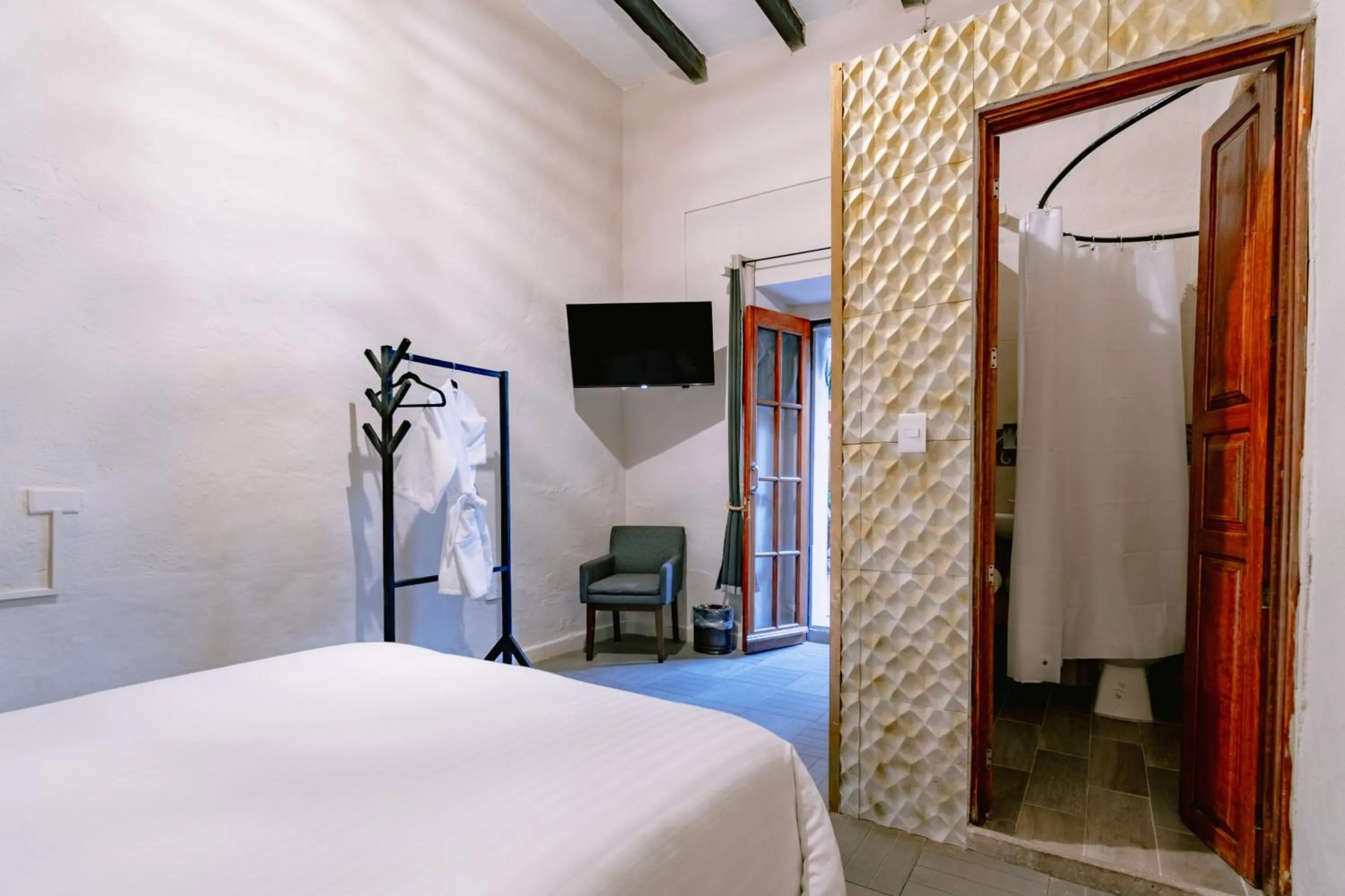 Photo of the whole room, Bed in Te Amo Hotel Boutique